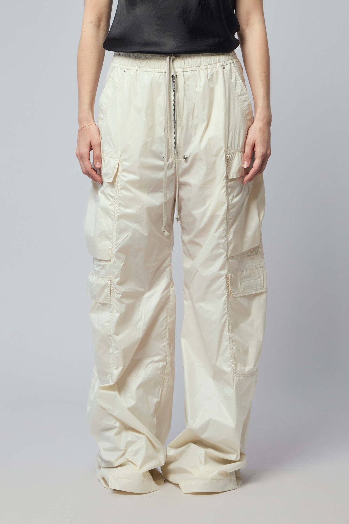 Side view of DRKSHDW cargo pants showing pocket details and silhouette