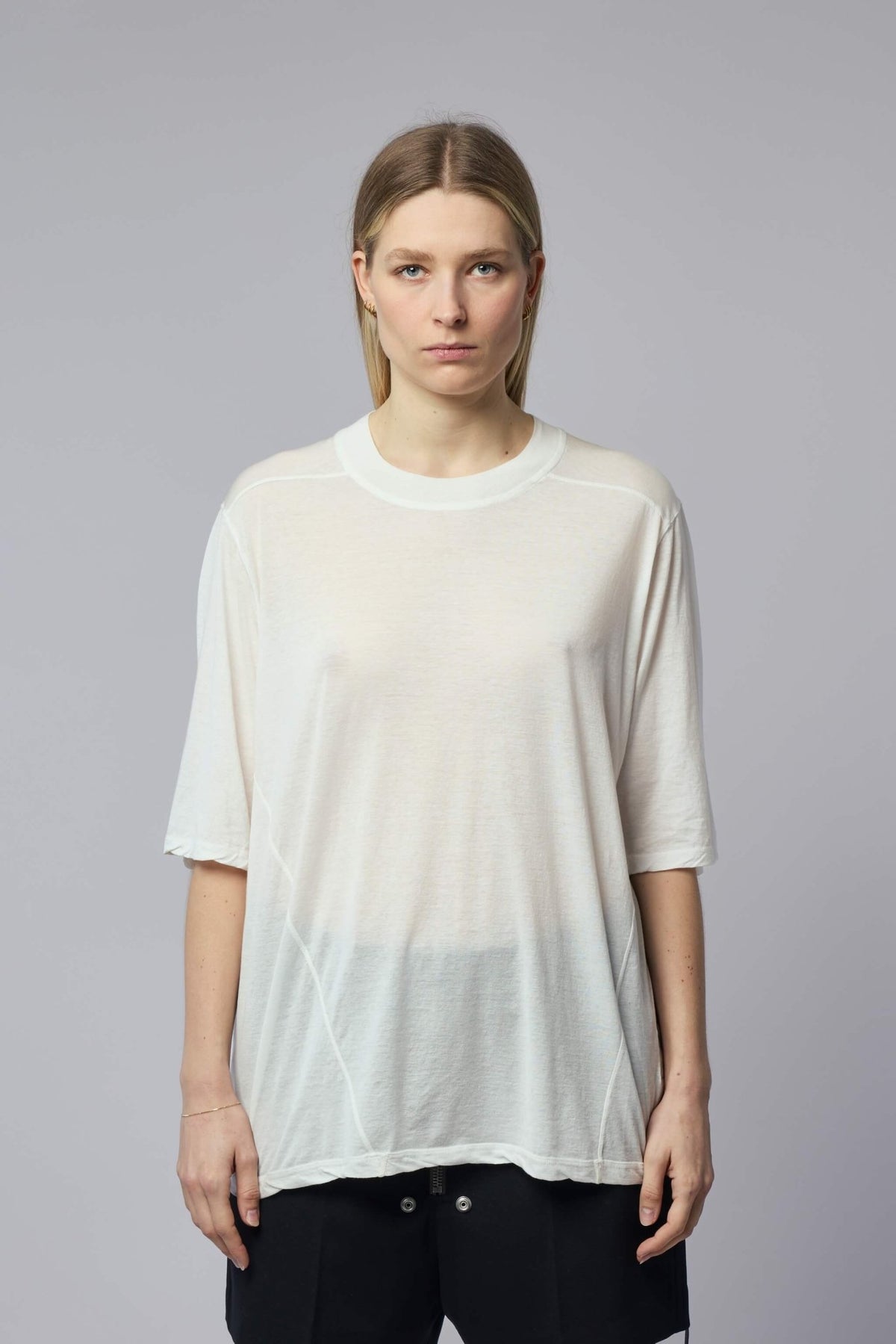 Model wearing Rick Owens DRKSHDW white semi-sheer cotton t-shirt