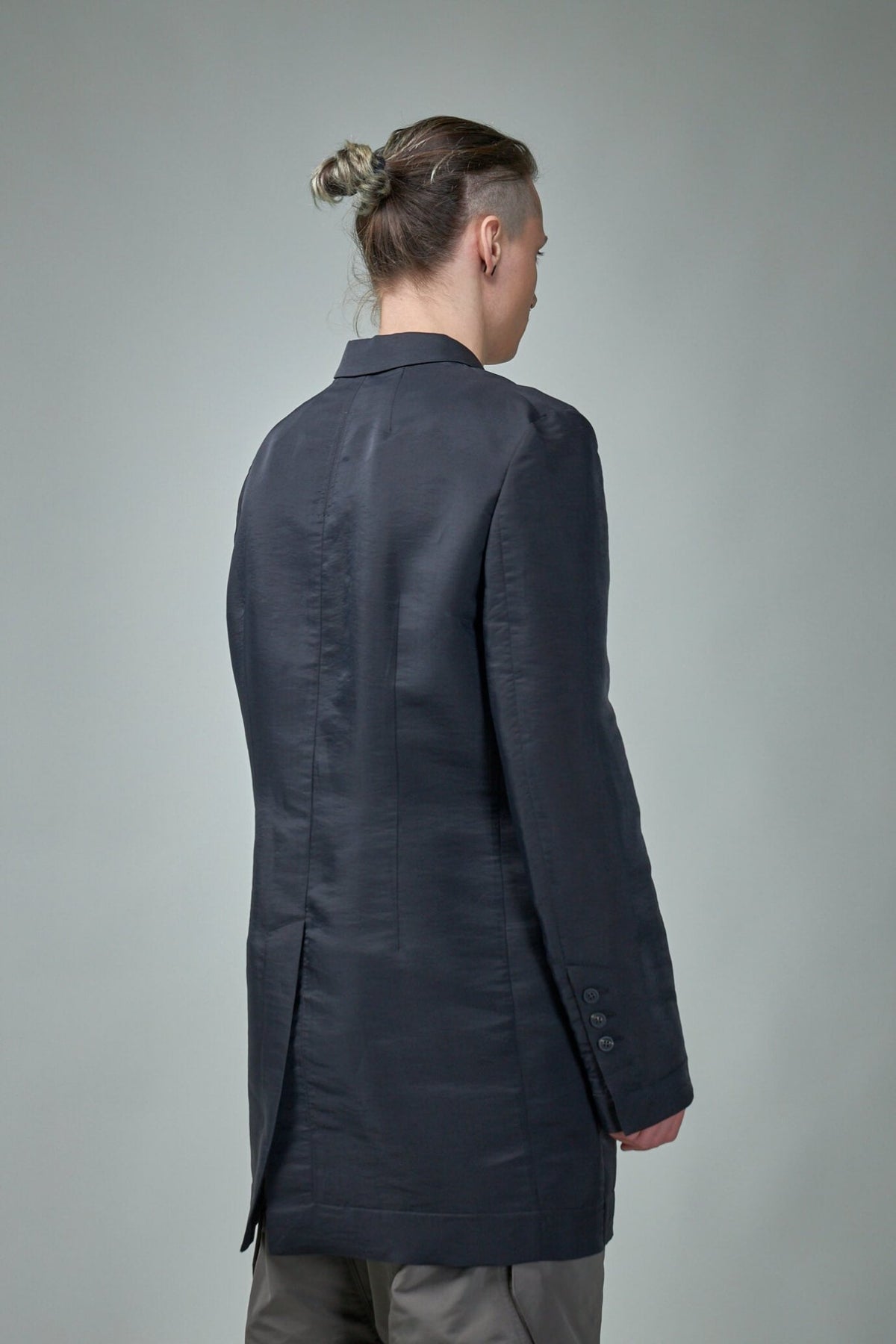 Model wearing Rick Owens Giacca Lido blazer showcasing architectural silhouette
