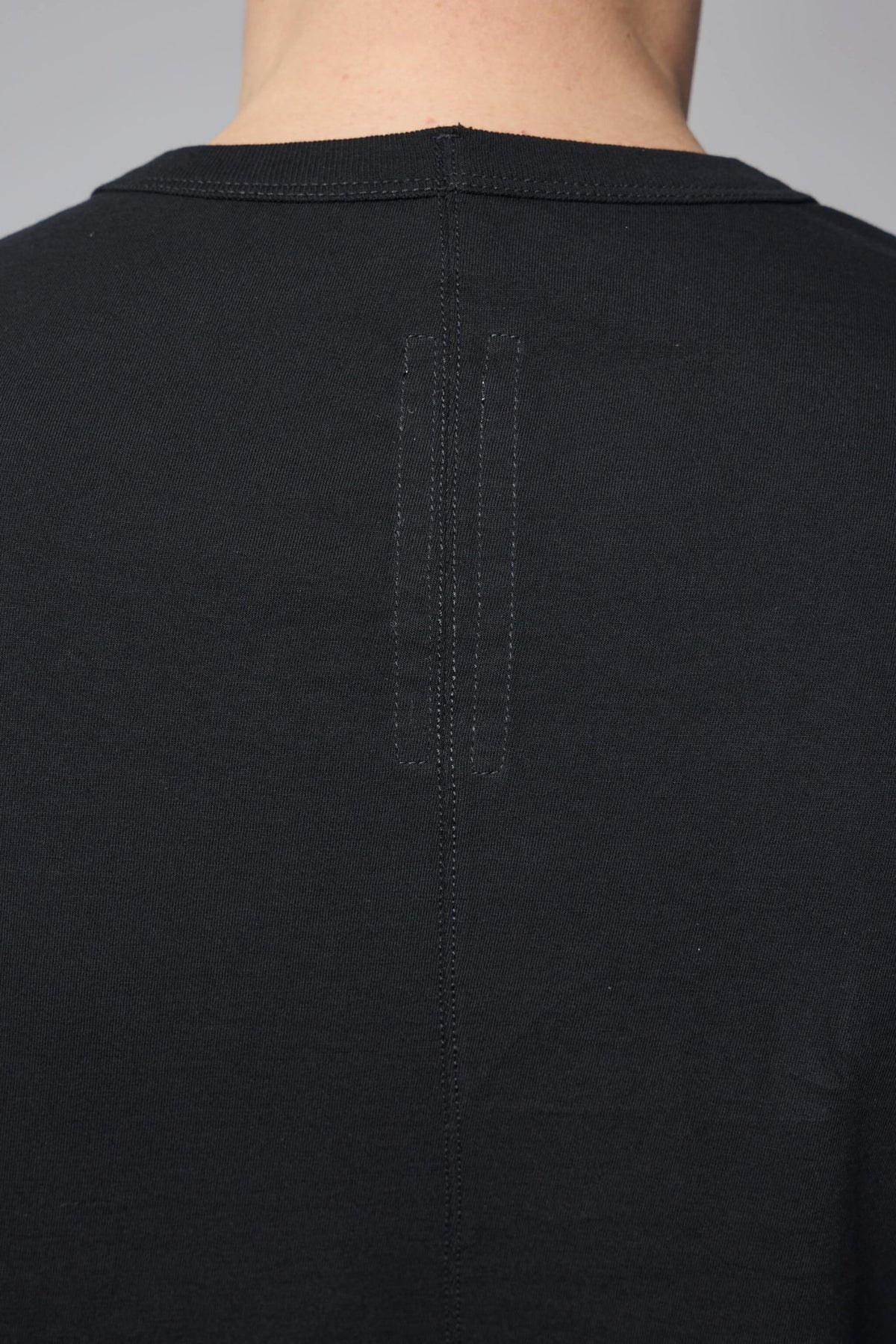 Close-up of Rick Owens t-shirt fabric texture and construction details, view 6