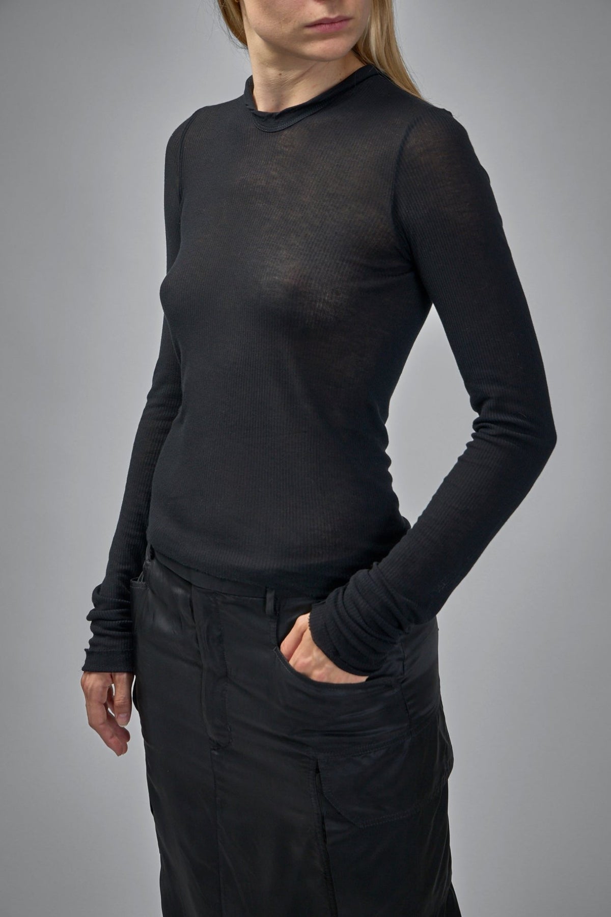 Side view of Rick Owens knit t-shirt displaying seamless hood construction