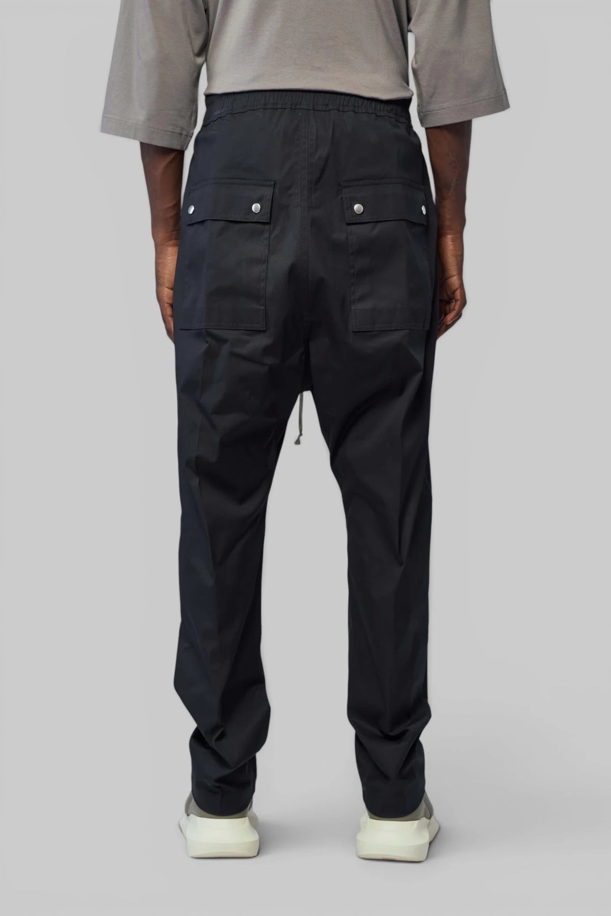 Metal rivet accents on Rick Owens cargo trousers
