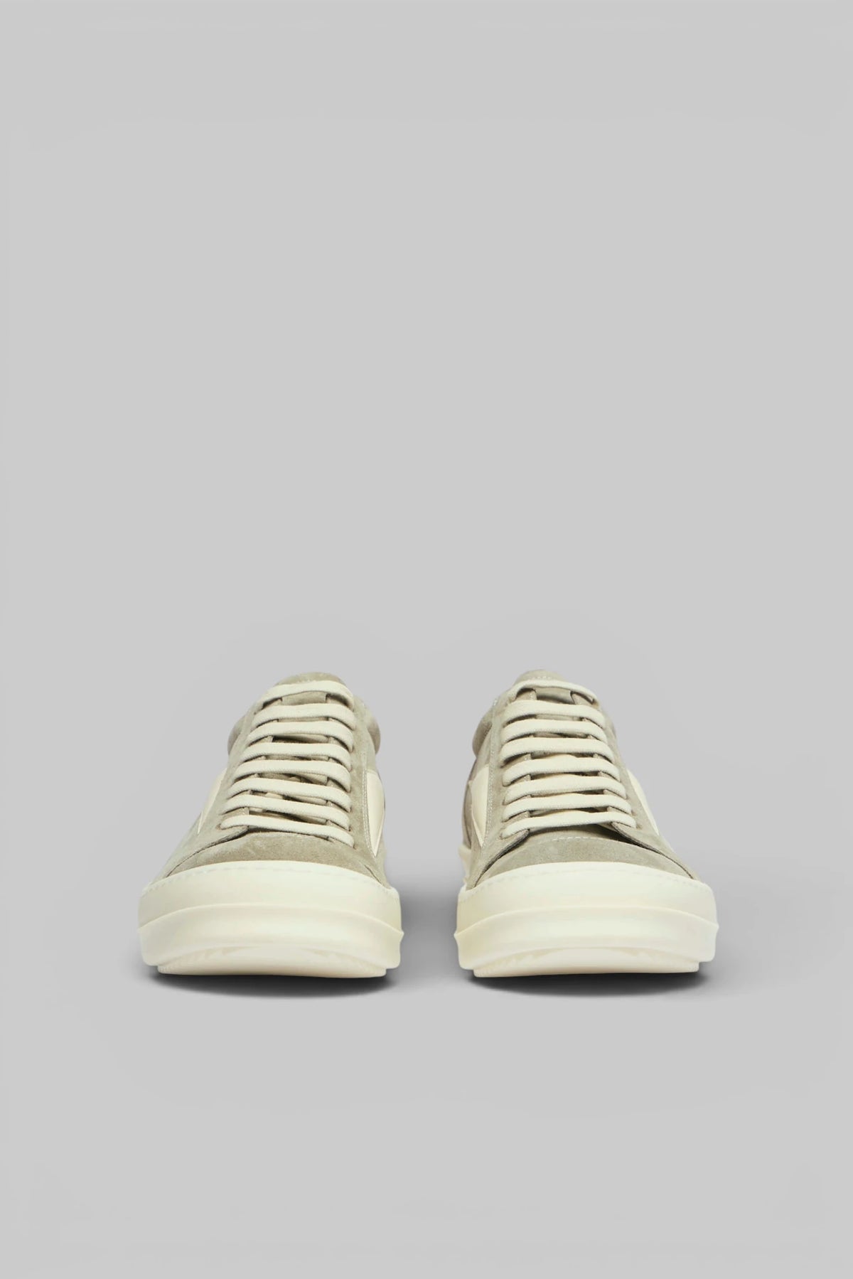 Side profile of Rick Owens leather sneaker with rubber sole