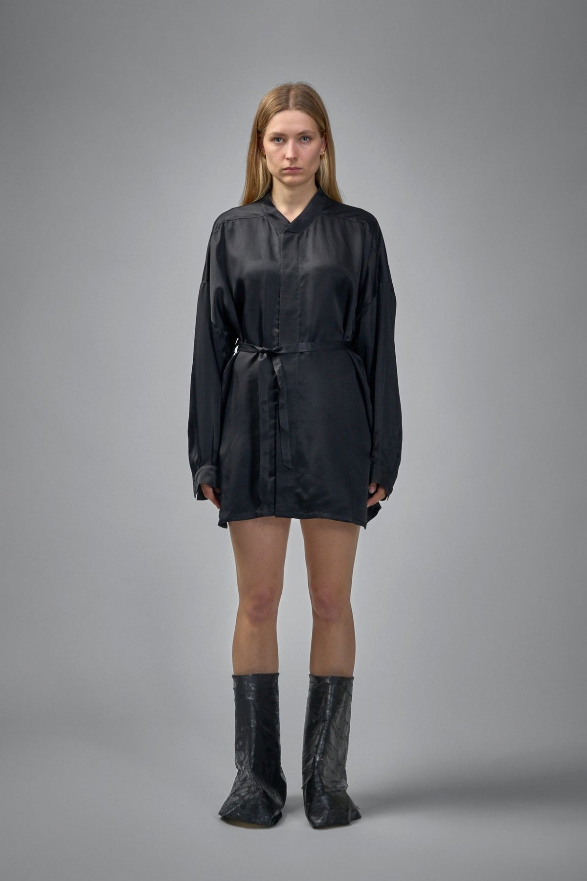 Close-up detail of Rick Owens shirt showing minimalist design and wool texture