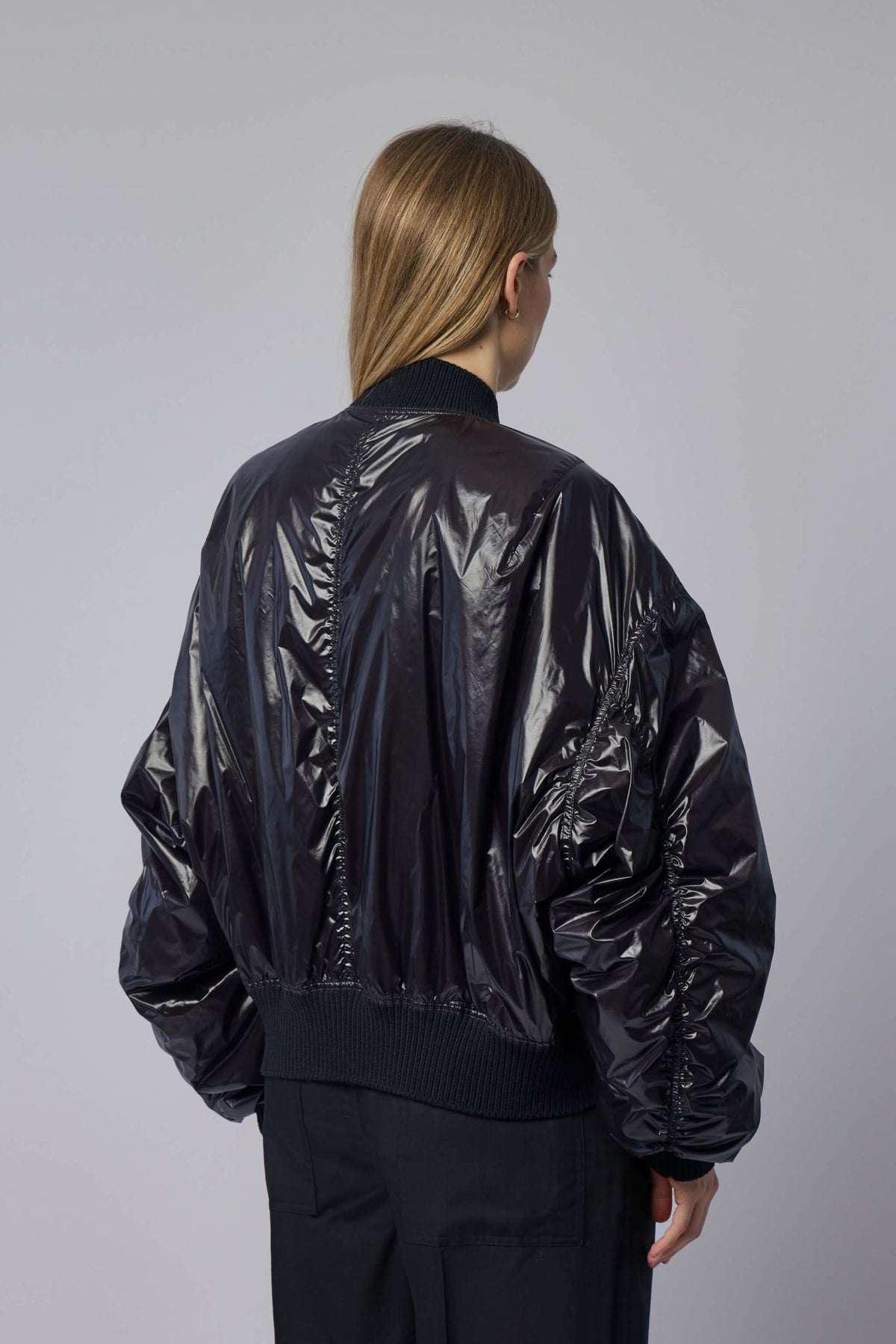 Back view of Rick Owens Secchia Flight bomber jacket highlighting padded construction, view 5
