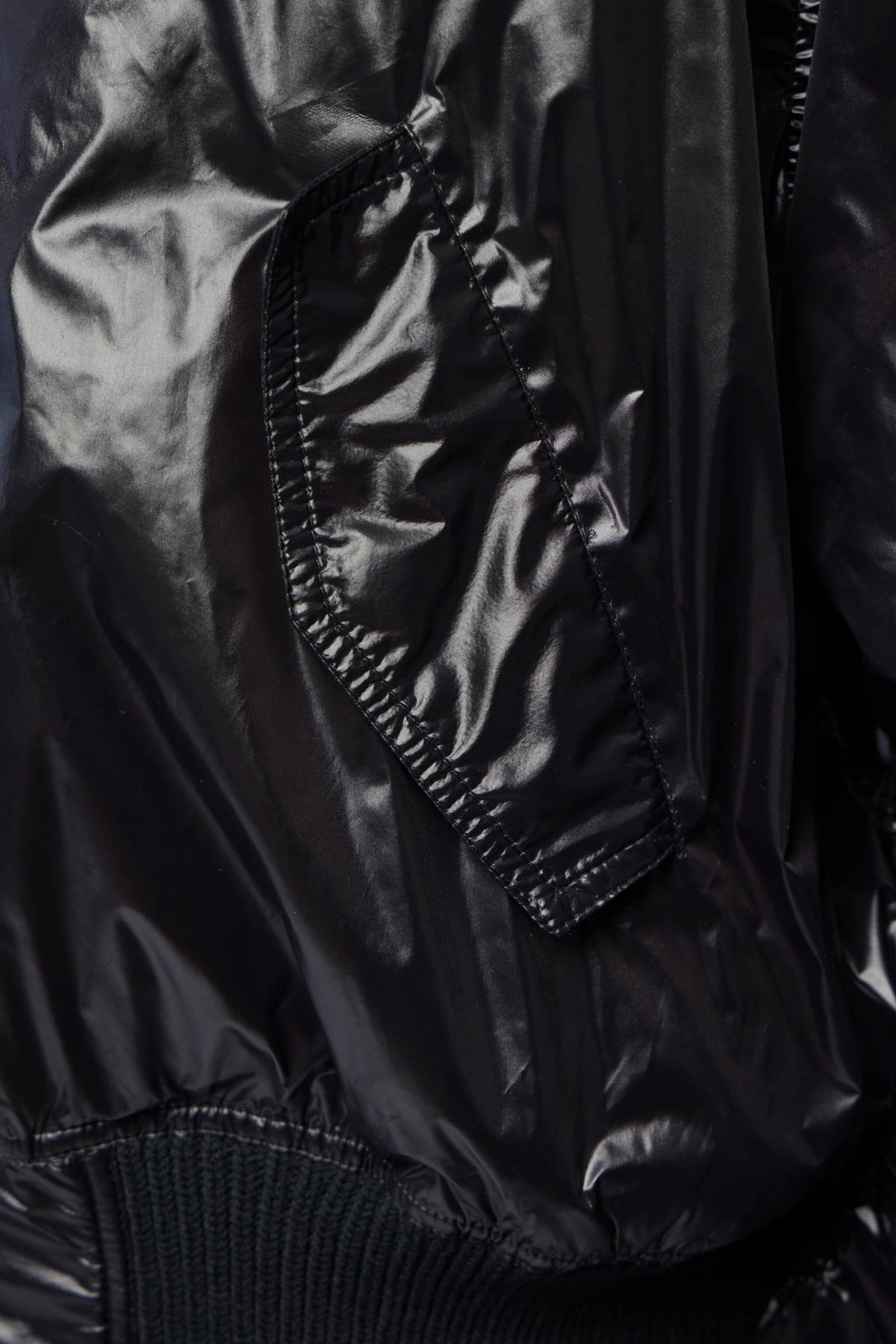 Back view of Rick Owens Secchia Flight bomber jacket highlighting padded construction