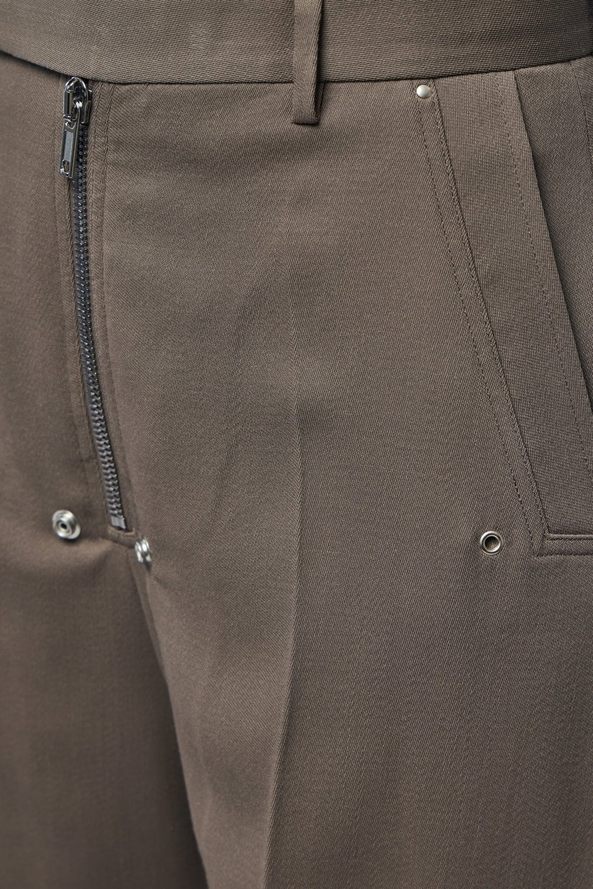 Detail shot of Rick Owens pants texture and craftsmanship in premium wool fabric