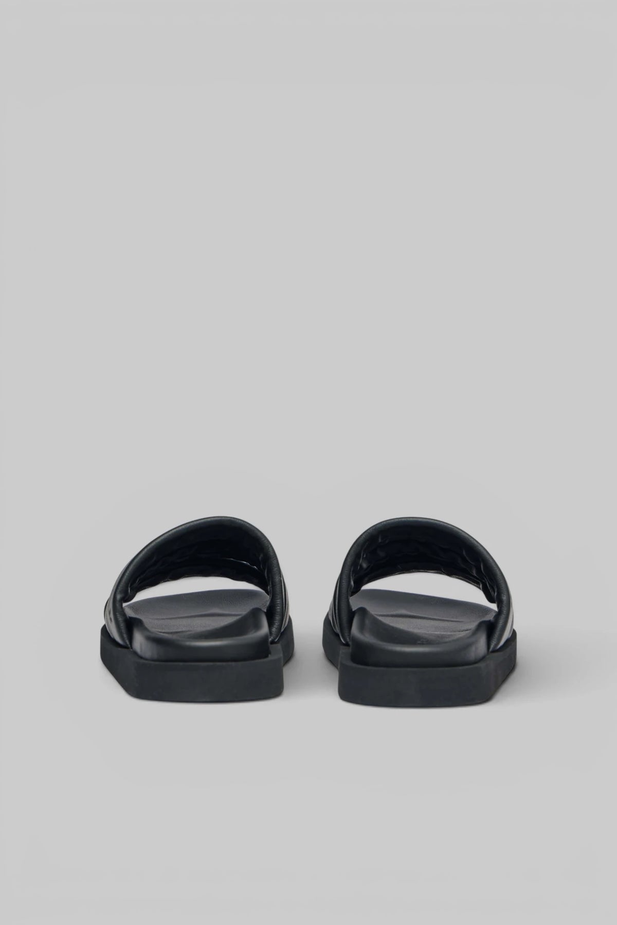 Side view of Signed by You Sandals open toe design