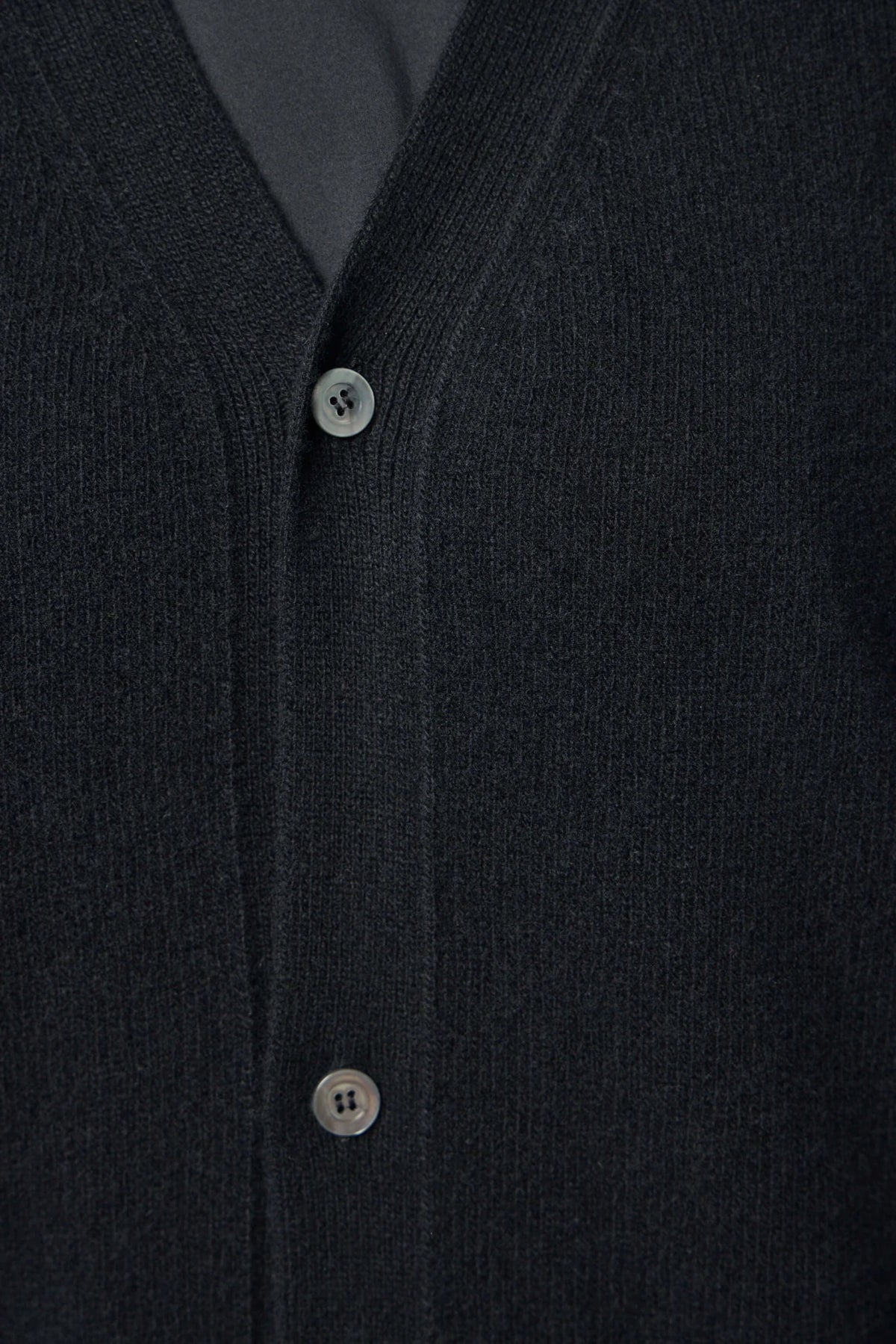 Sofie D'Hoore cardigan detail showing wool texture and stitching