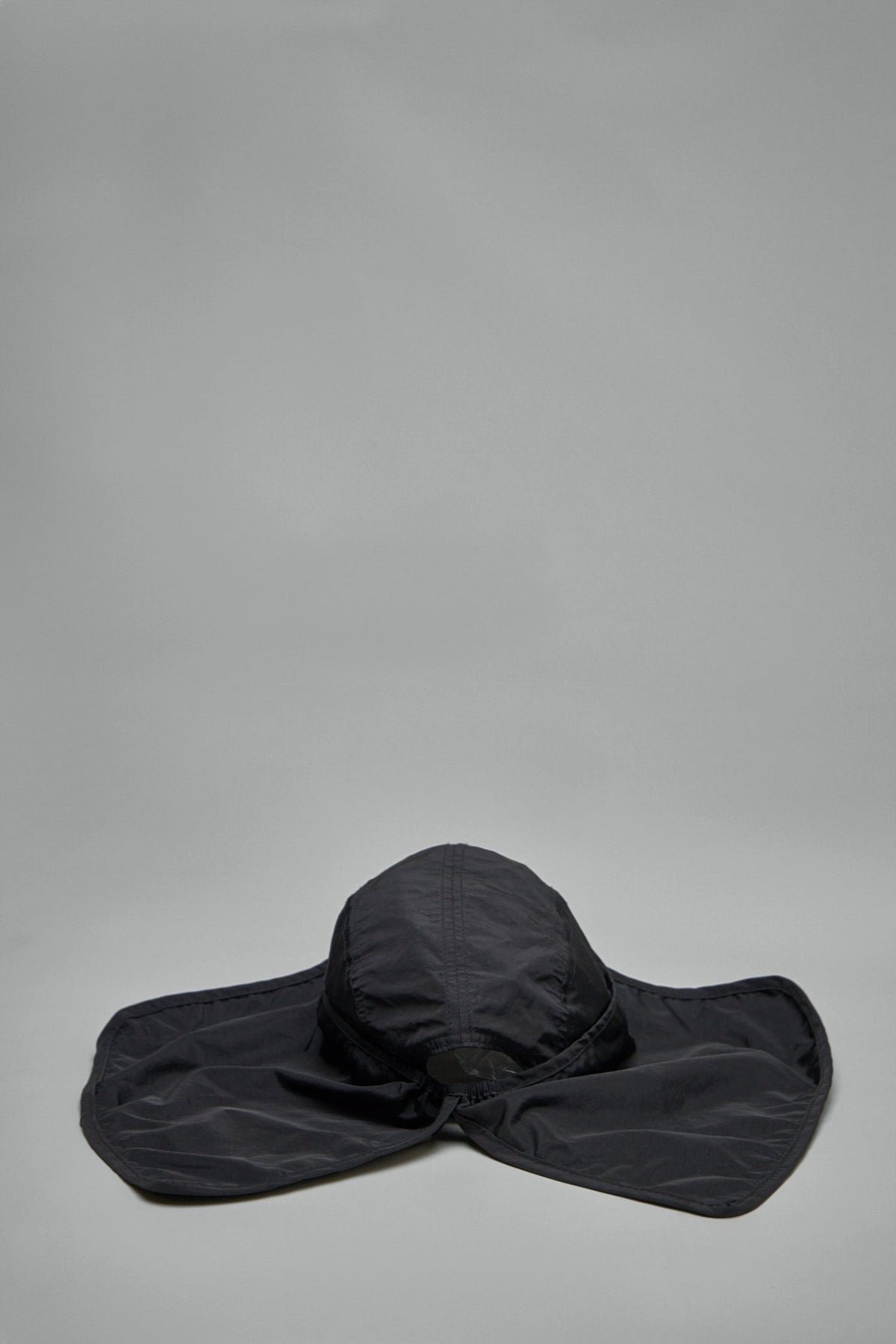Model wearing Havana cap demonstrating versatile styling options