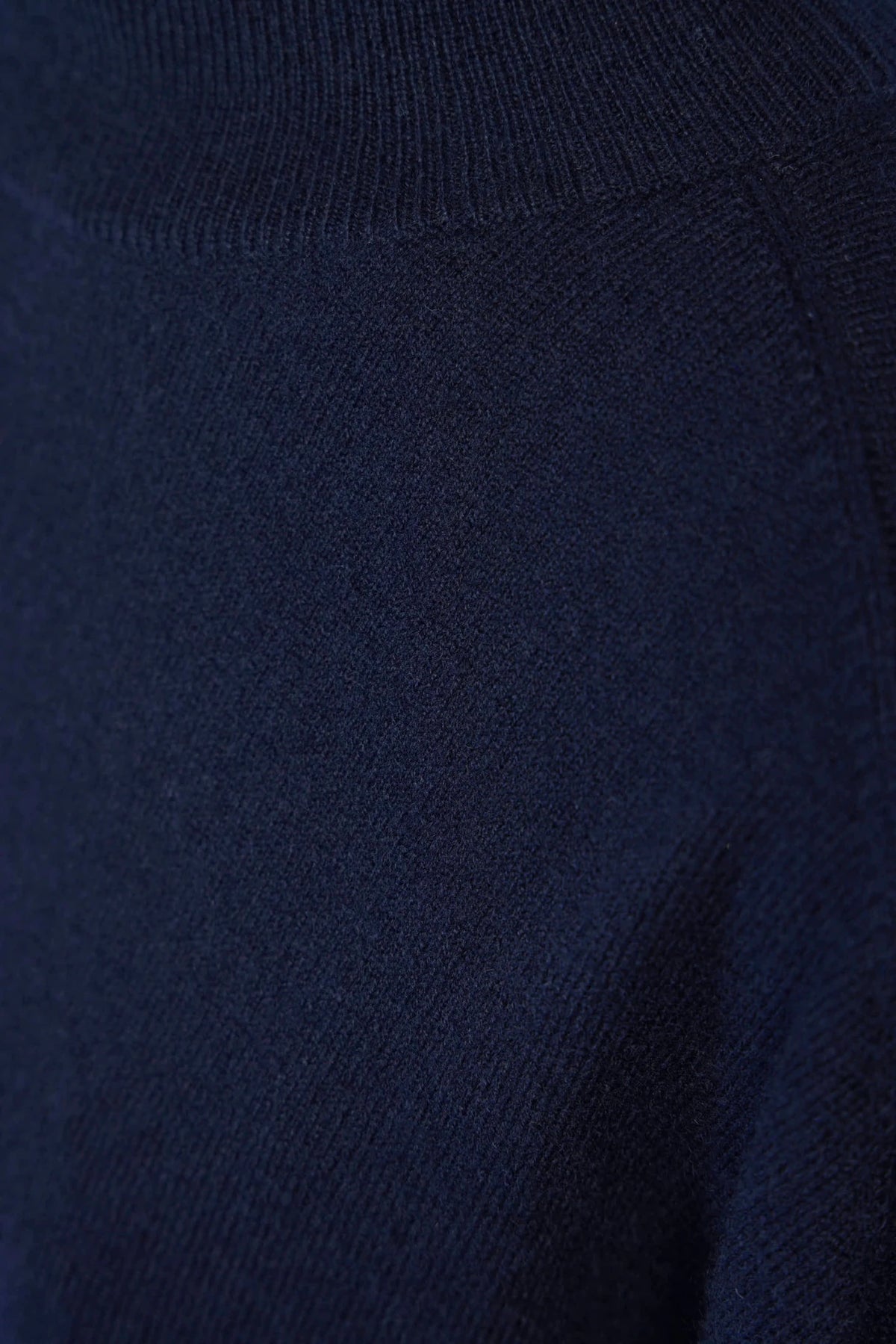 Detail shot of turtleneck collar on Sofie D'Hoore cashmere pullover