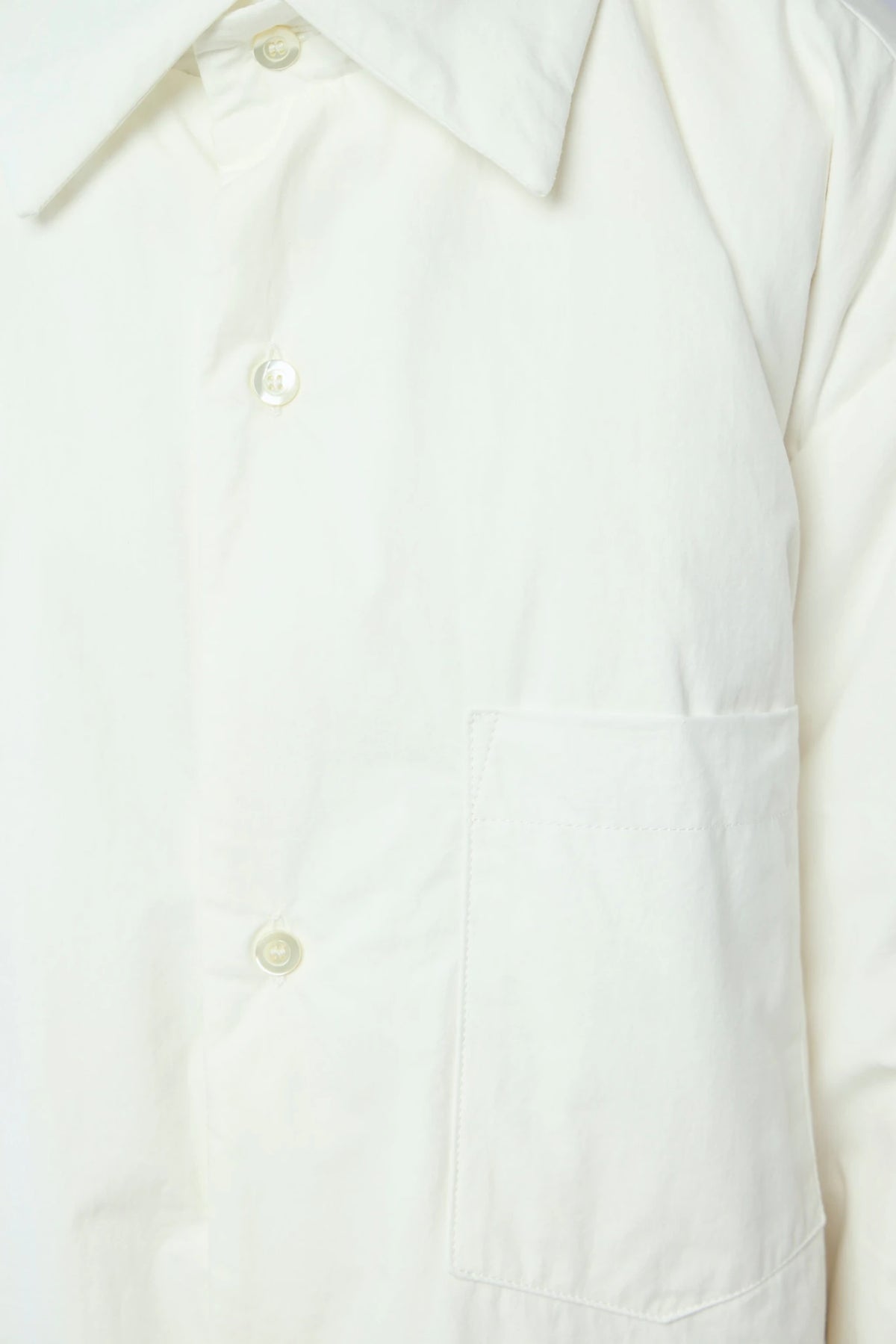 Detail shot of front chest pocket on Sofie D'Hoore down jacket