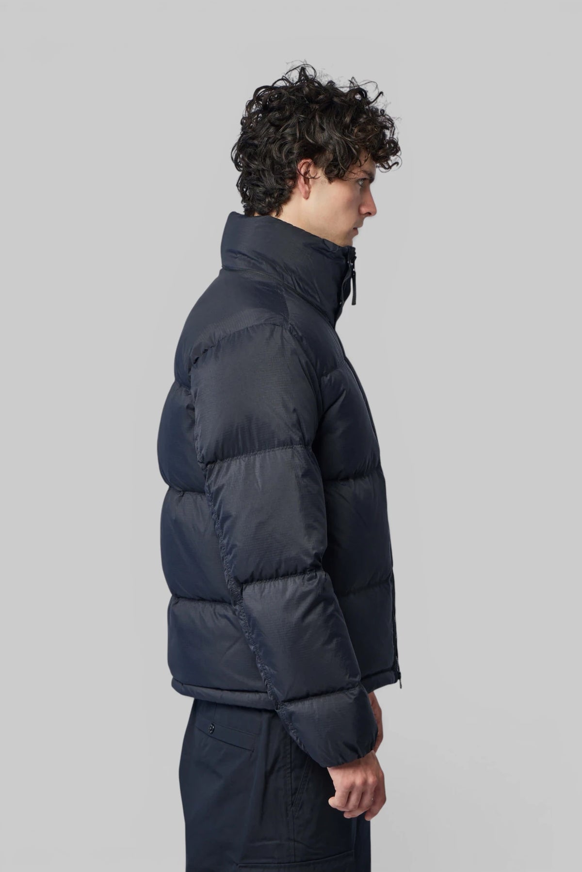 Back view of Stone Island Down jacket high collar