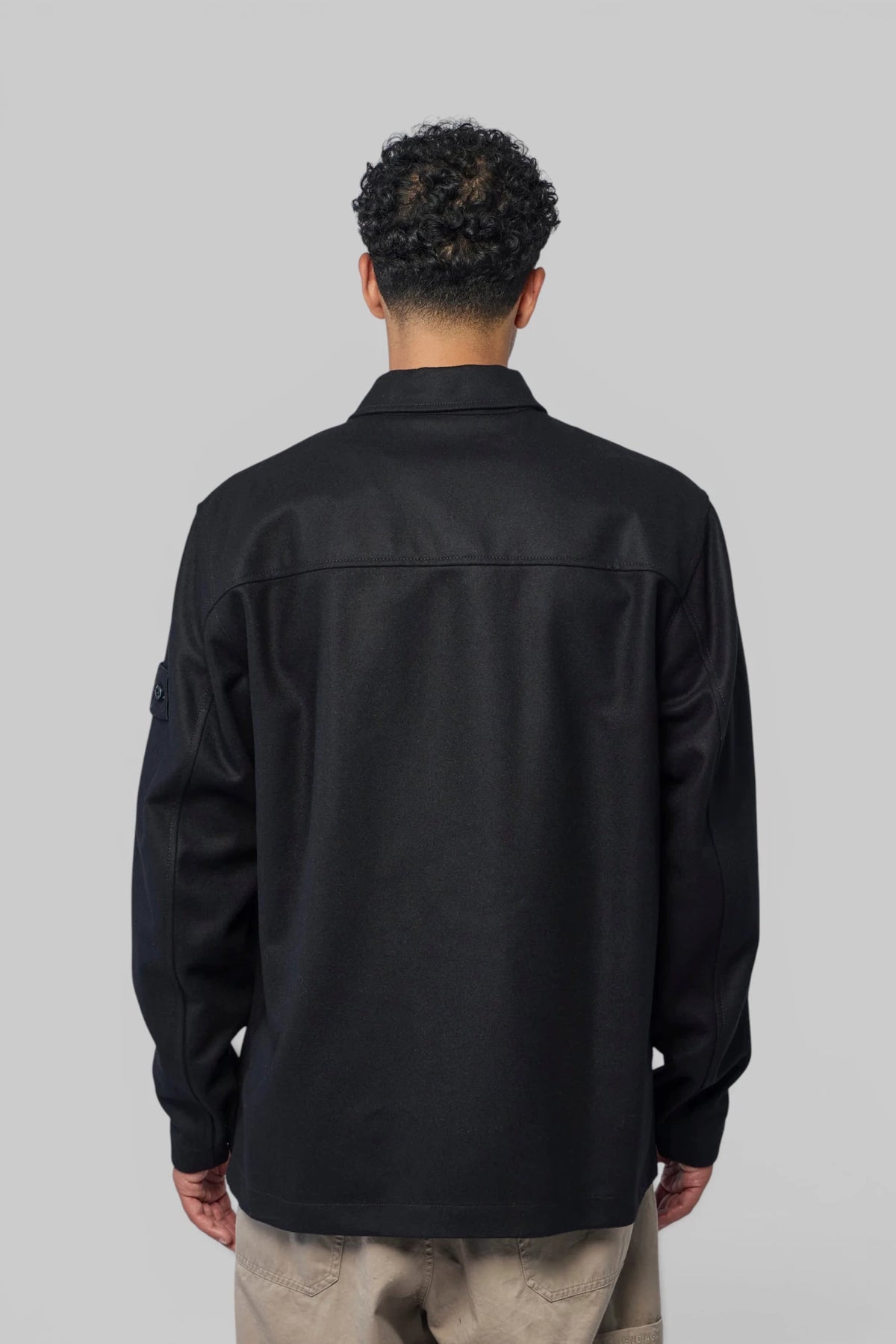 Back view of Stone Island shirt jacket in minimalist design