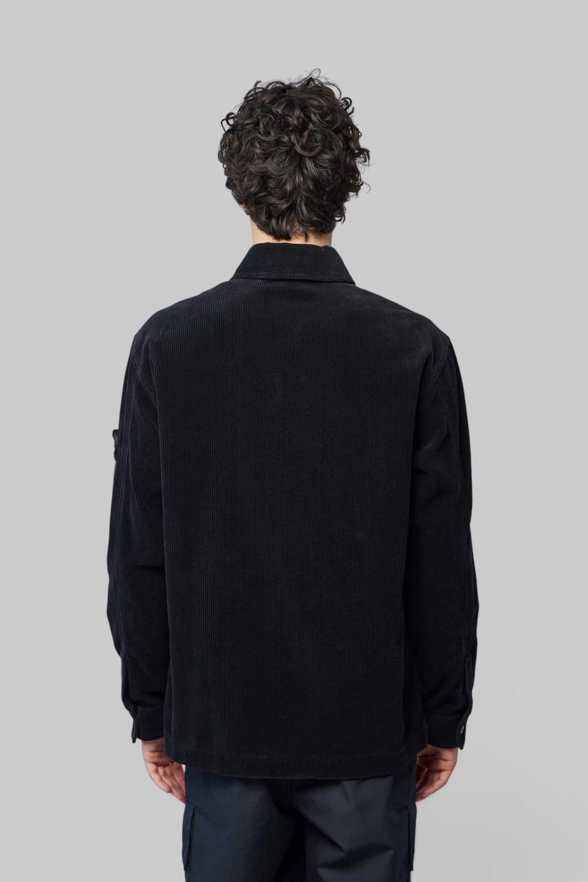 Stone Island bomber jacket styled with casual streetwear pieces