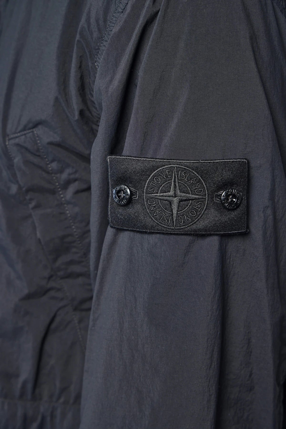 Back view of the hooded Stone Island parka, view 8