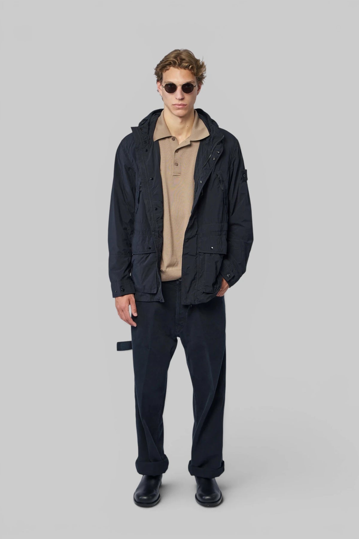 Front view of Stone Island Short Parka with button closure