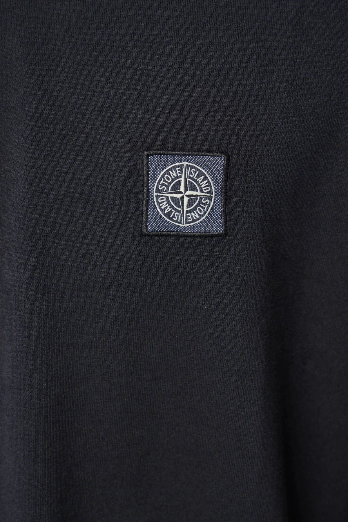 Model wearing Stone Island SS T-Shirt in relaxed fit