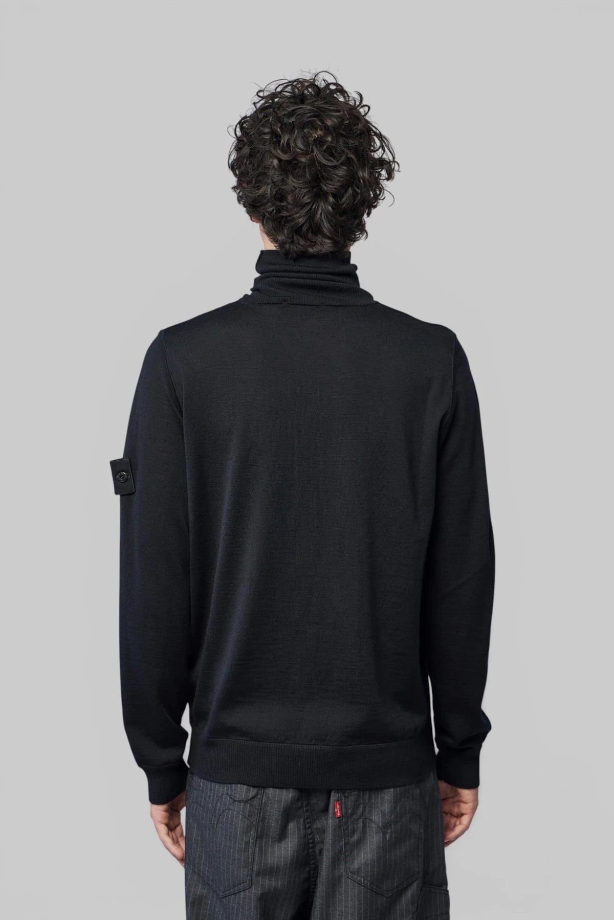 Back view of Stone Island t-neck sweater