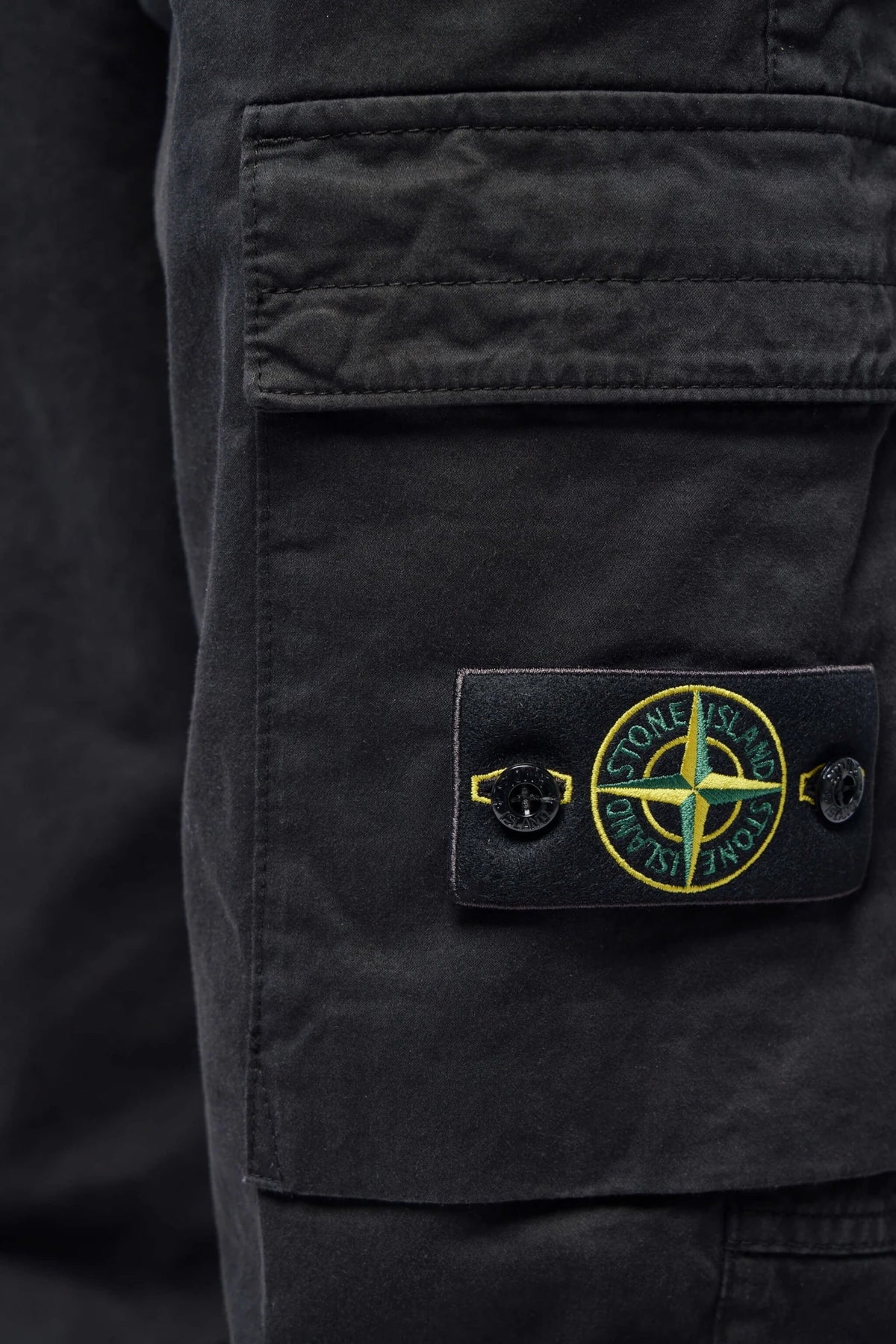 Stone Island Cargo Pants folded flat lay presentation