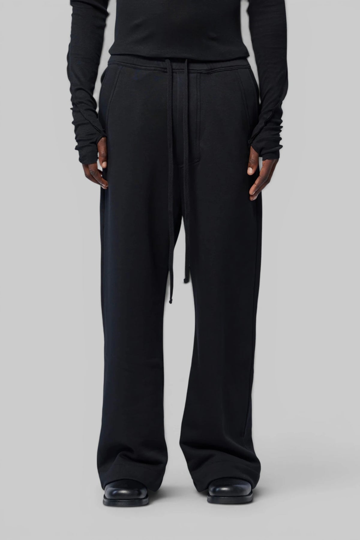 Close-up of rear pocket detail on Thom Krom cargo pants