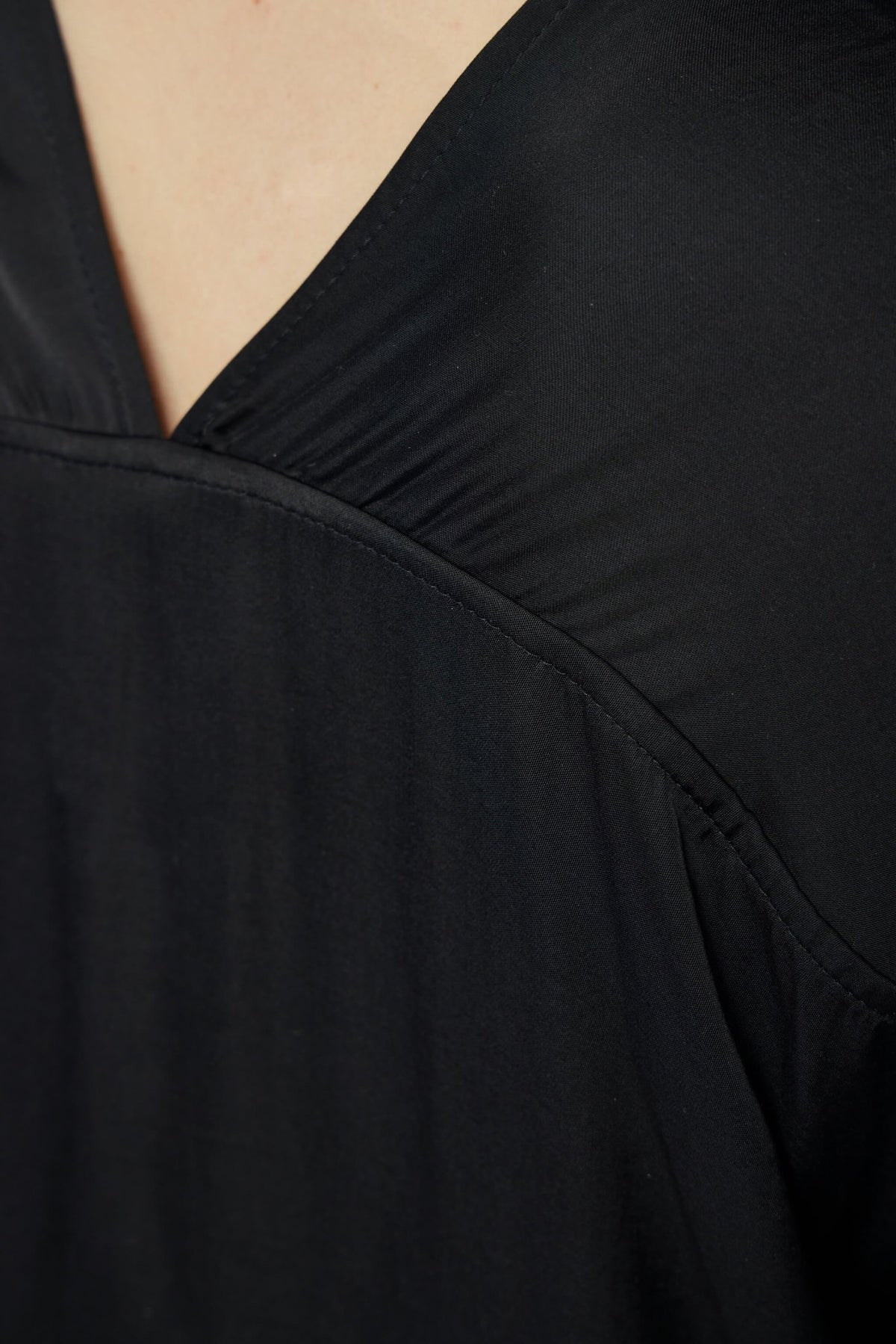 Full outfit styling with black viscose blouse