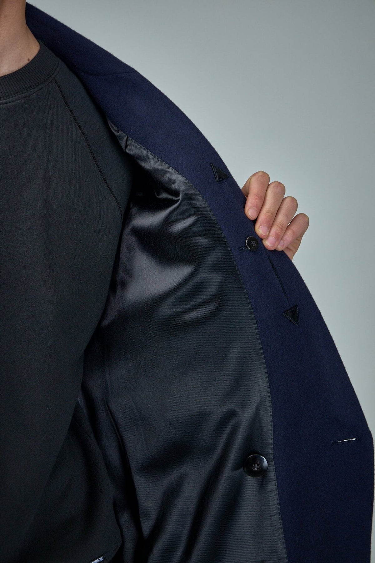 Full-length view of TOM FORD Atticus coat styled for formal wear