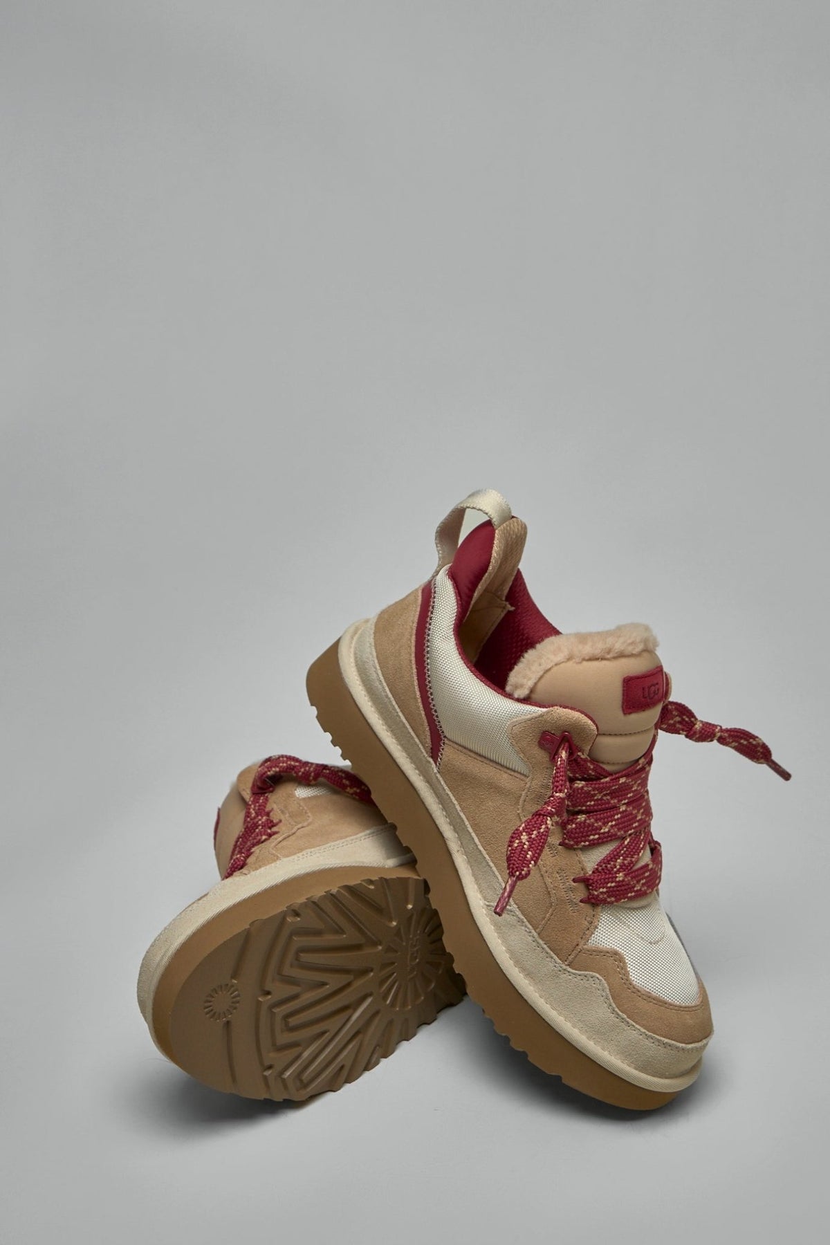 Detail shot of UGG Lowmel sneaker laces and mixed material construction