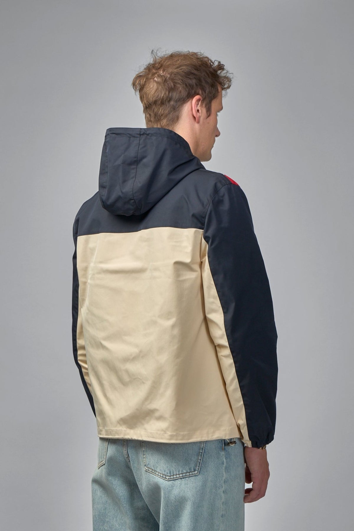 Detail shot of adjustable hood and zipper on Valentino VLogo jacket