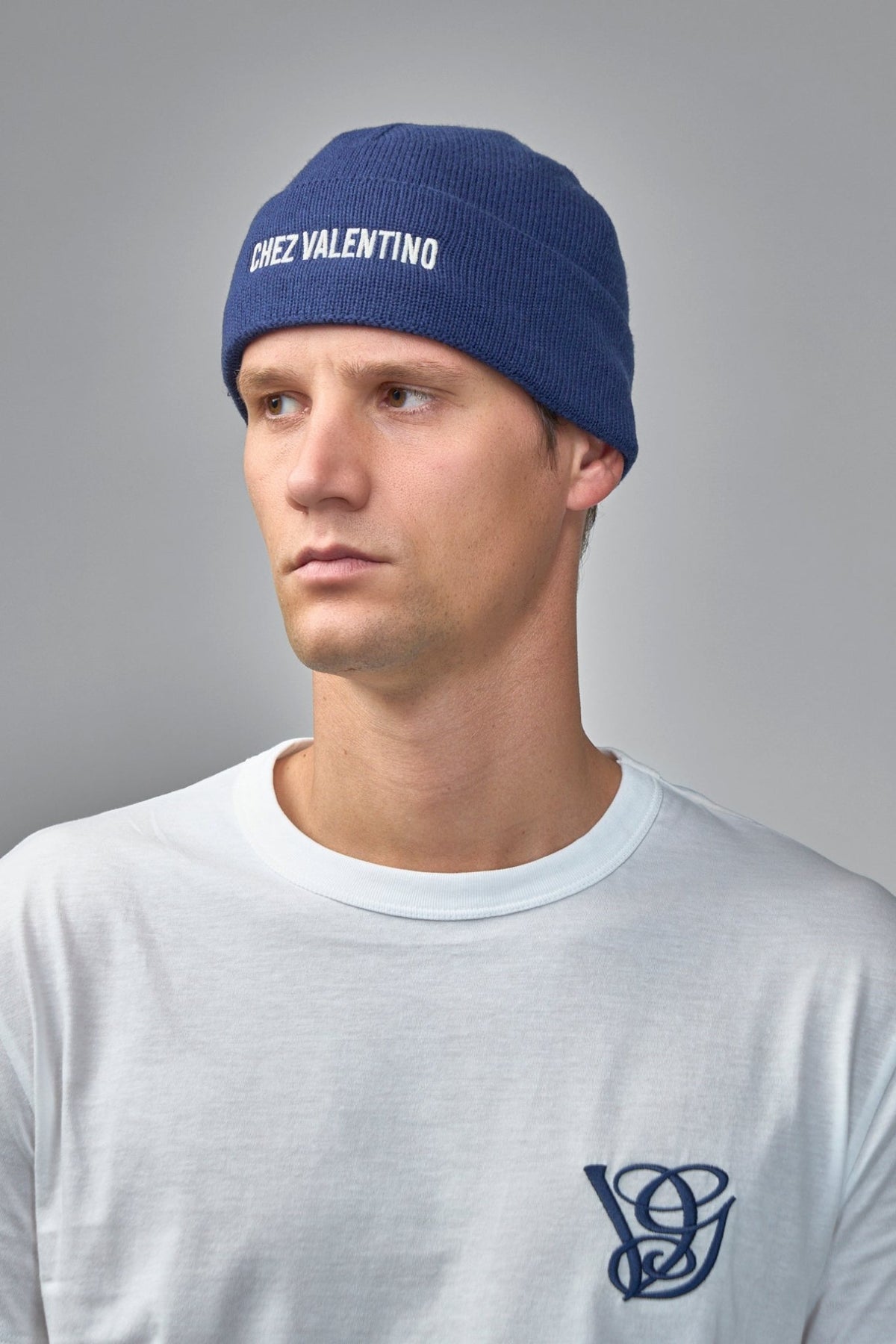 Valentino beanie flat lay showing rounded crown and ribbed texture