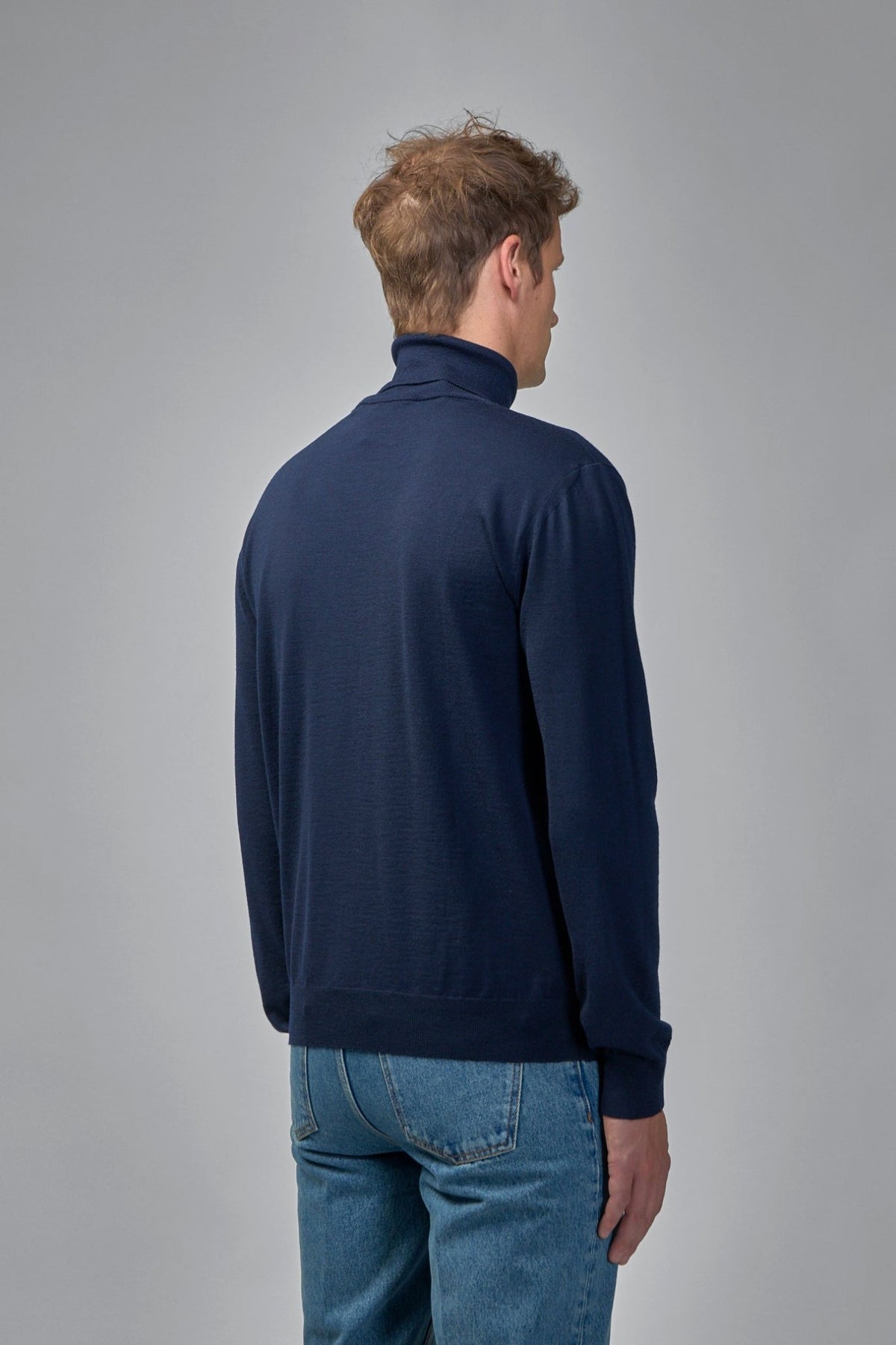 Ribbed collar and cuff details on Valentino luxury knitwear
