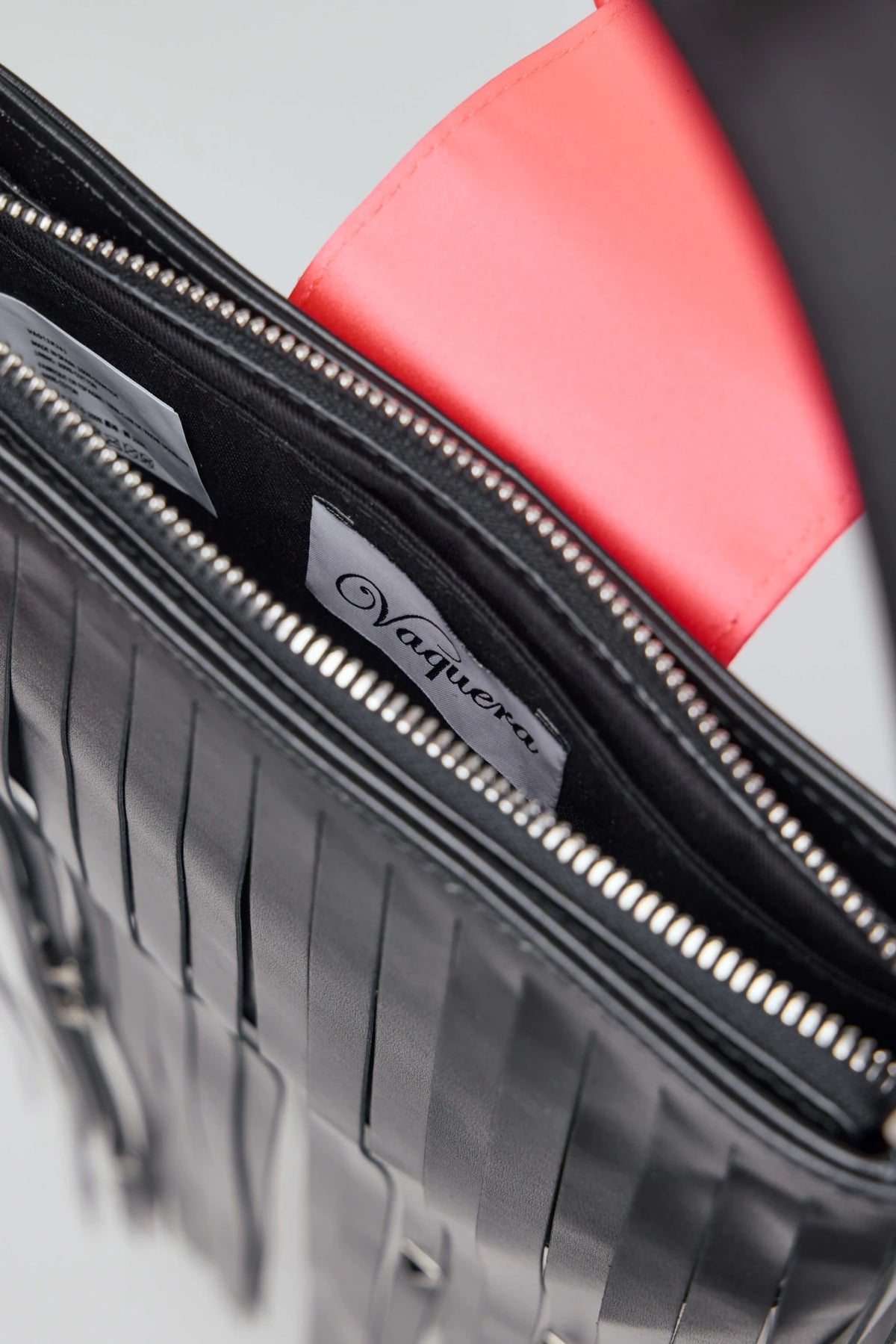 Metallic stud accents on Vaquera leather top handle bag