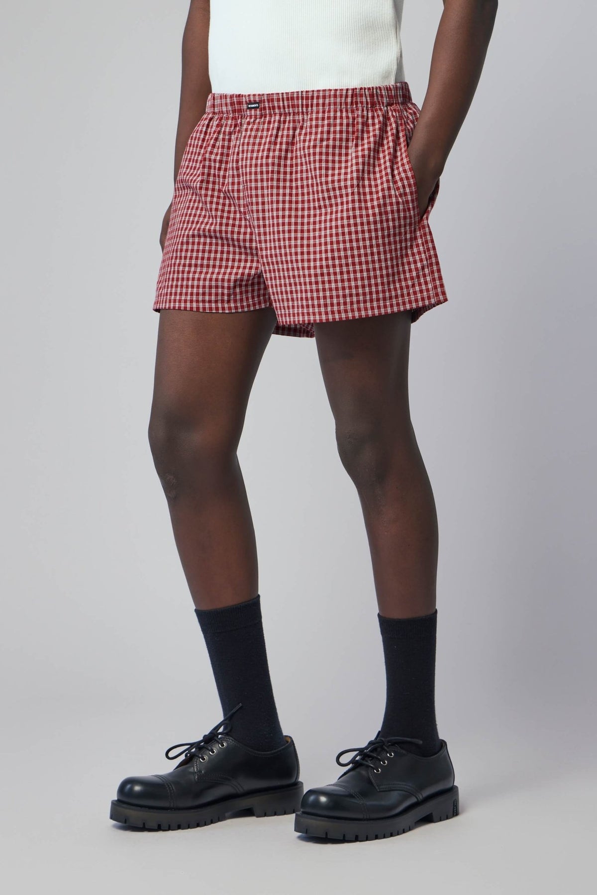 Side view of push-up shirting shorts showing fit