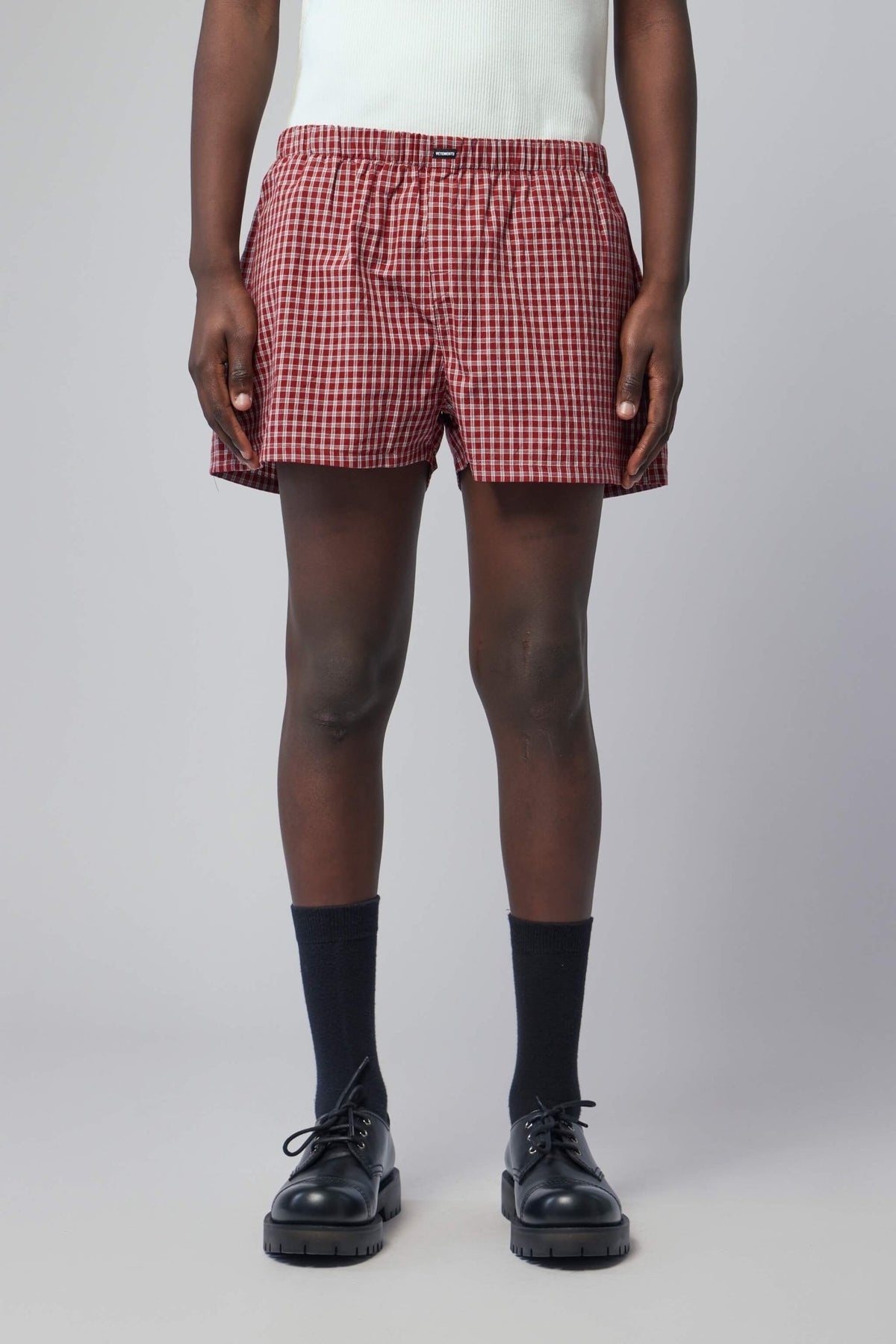 Close-up detail of Vetements shorts construction and fabric