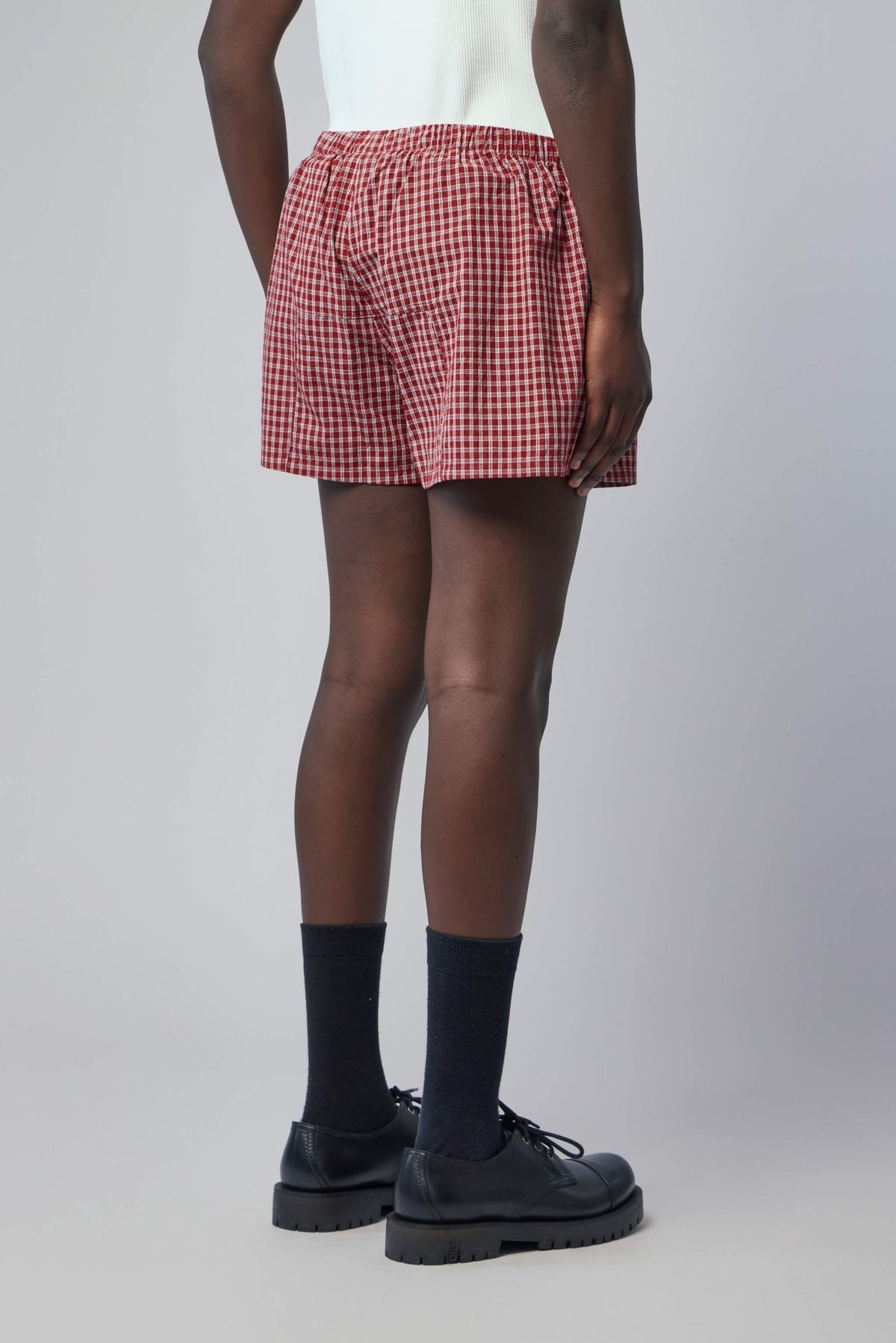 Flat lay of push-up shirting shorts showing design details