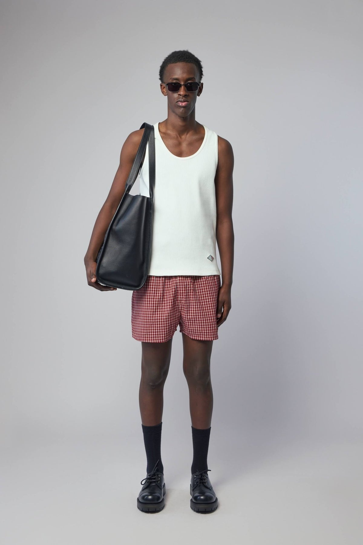 Model wearing Vetements shorts in casual styling