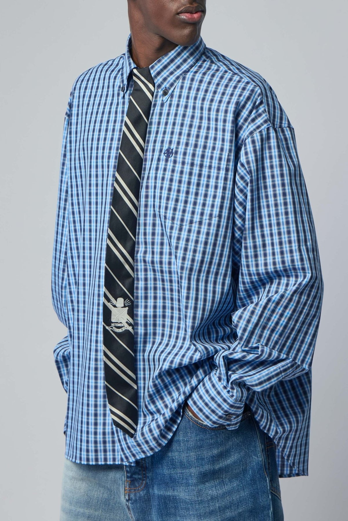 men - Model wearing Vetements Tie Classic Shirt demonstrating oversized fit