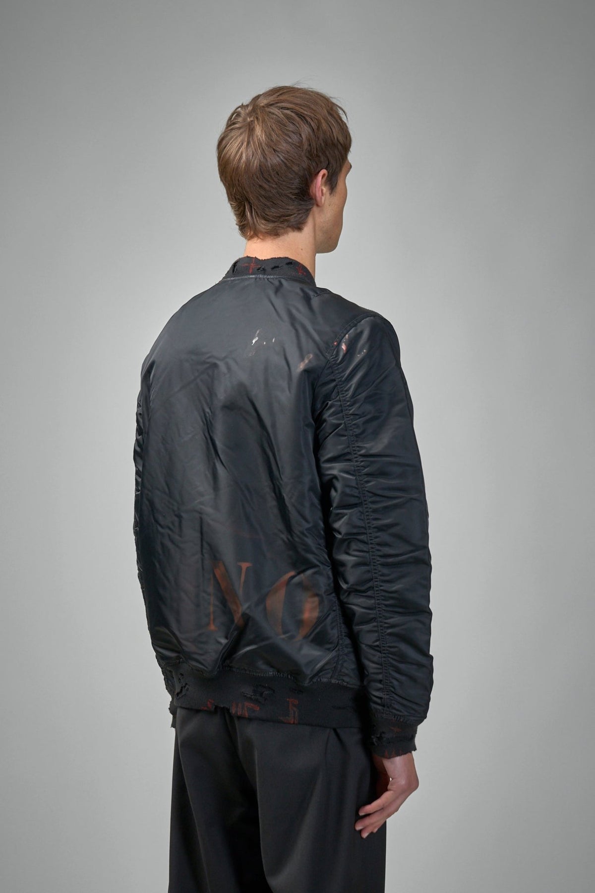 Model wearing Vintage Industries KH bomber jacket in black