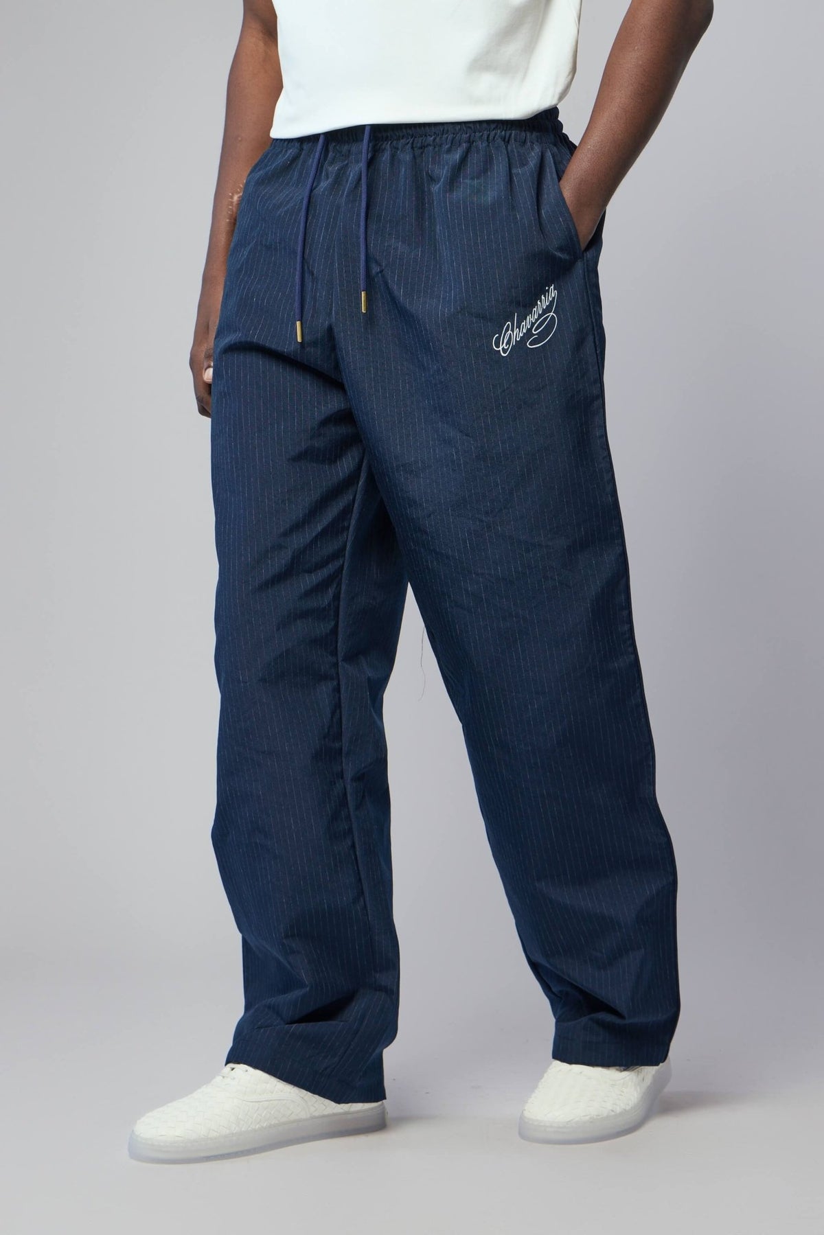Close-up detail of cargo pant construction and fabric texture