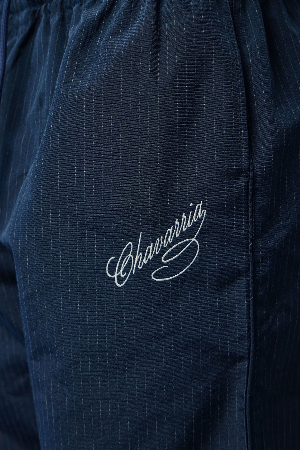 Side view of Willy Chavarria track pants styling