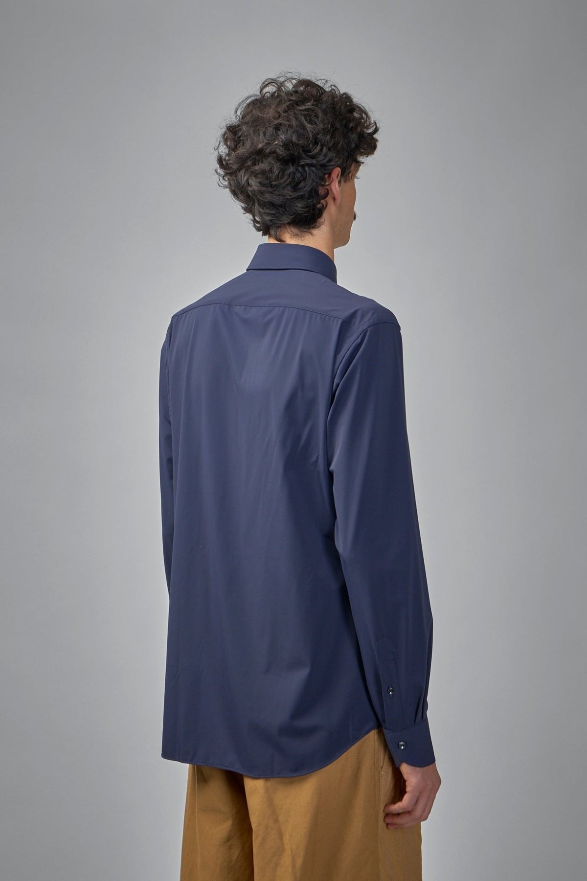 Back view showing tailored fit and yoke construction
