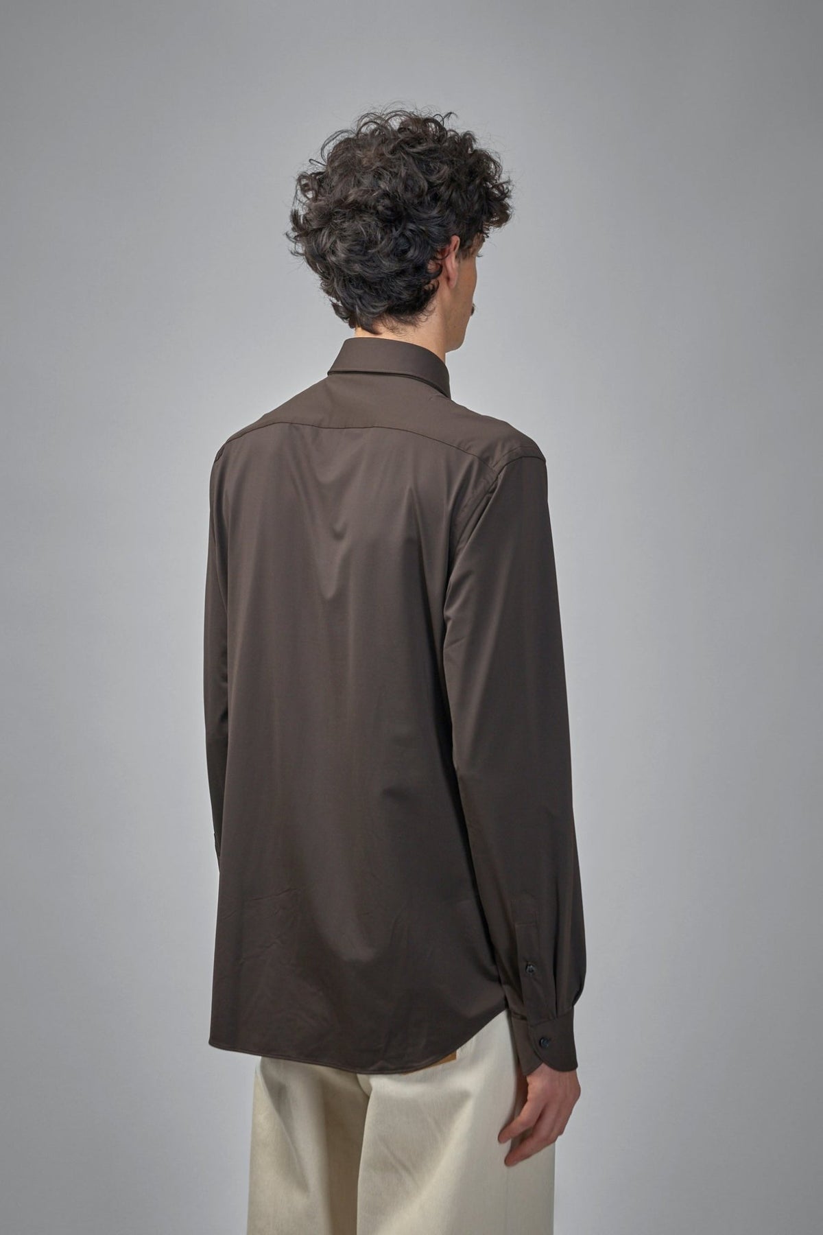 Full view of Xacus performance dress shirt on model