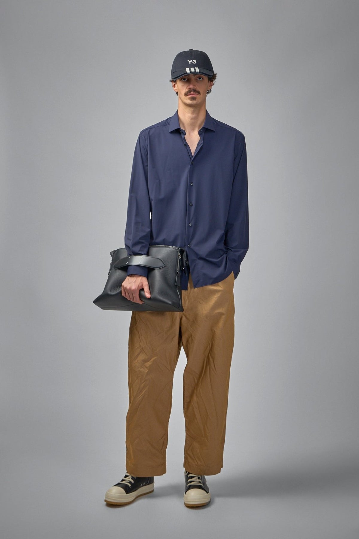 Close-up view of Xacus shirt collar and button details