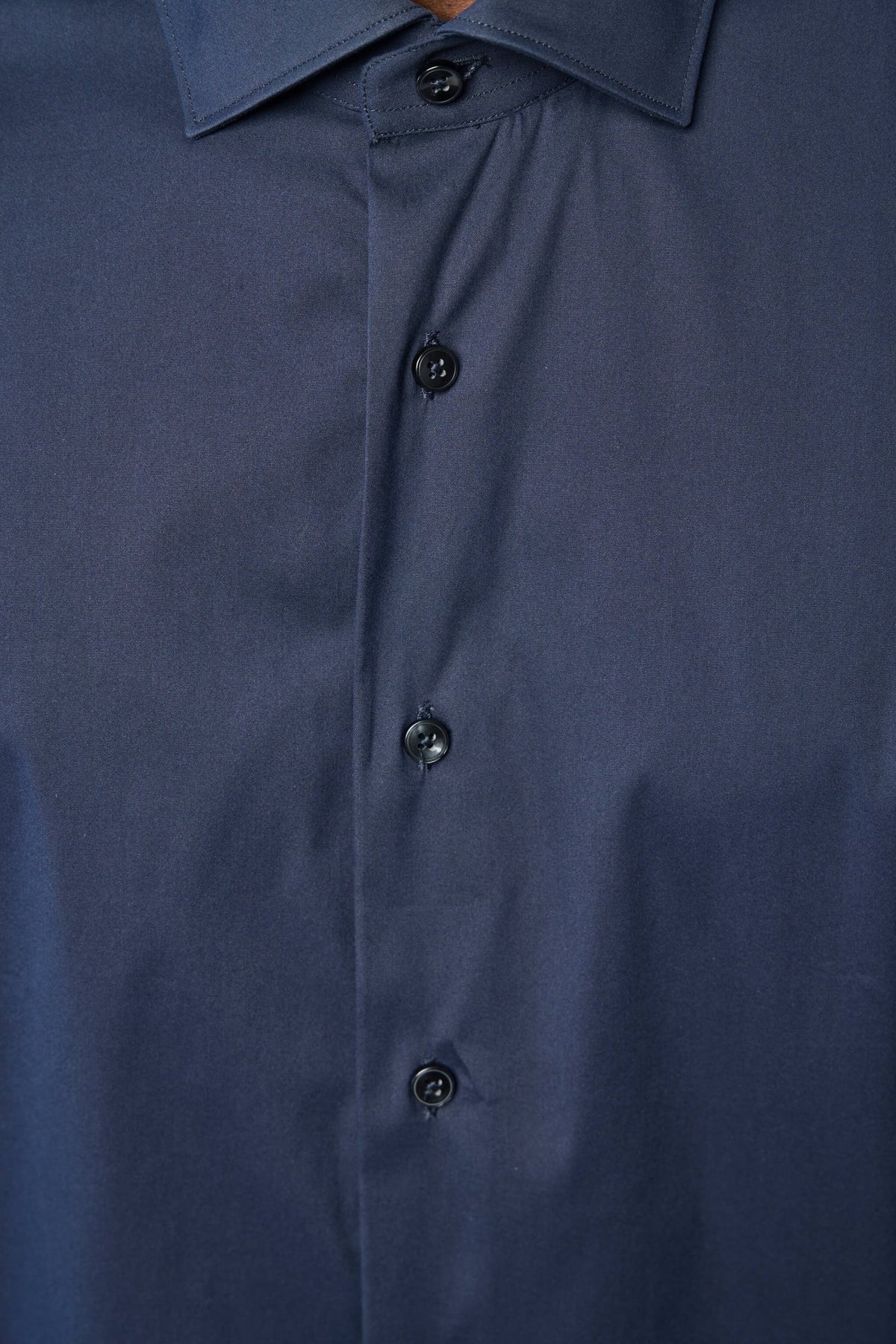 Xacus shirt collar and button detail showing Italian craftsmanship