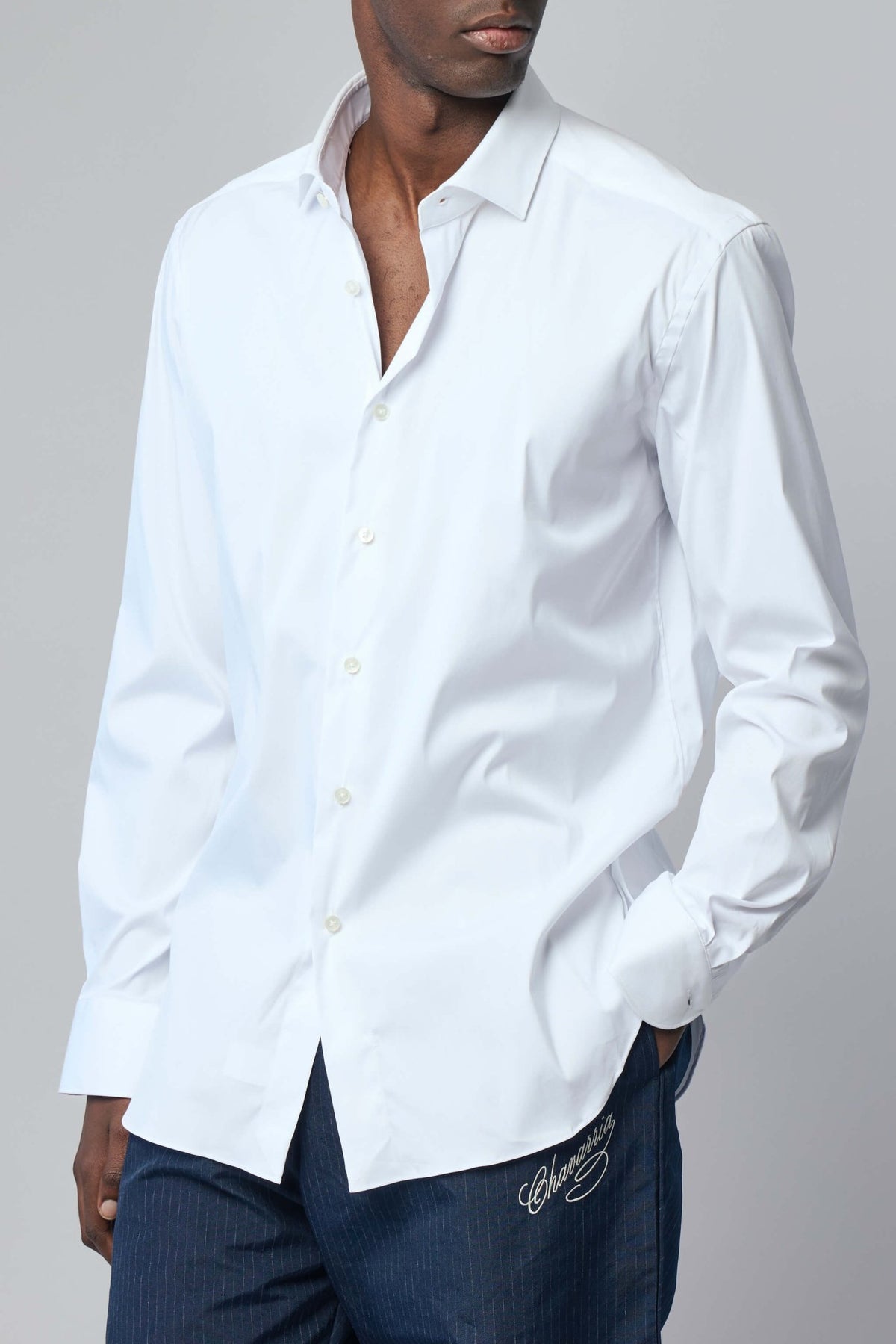 Full view of Xacus classic dress shirt on model showing true to size fit