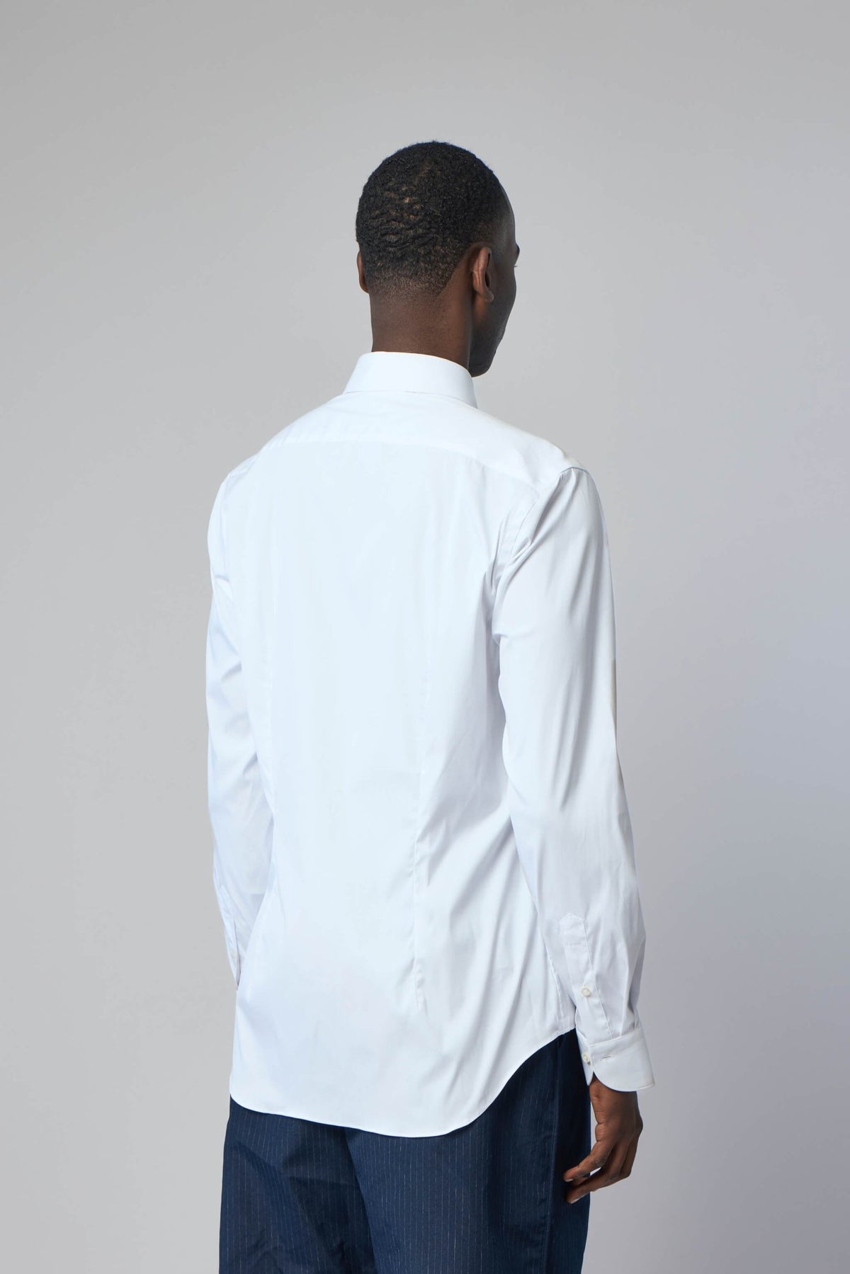Side view of Xacus dress shirt showing classic tailored silhouette