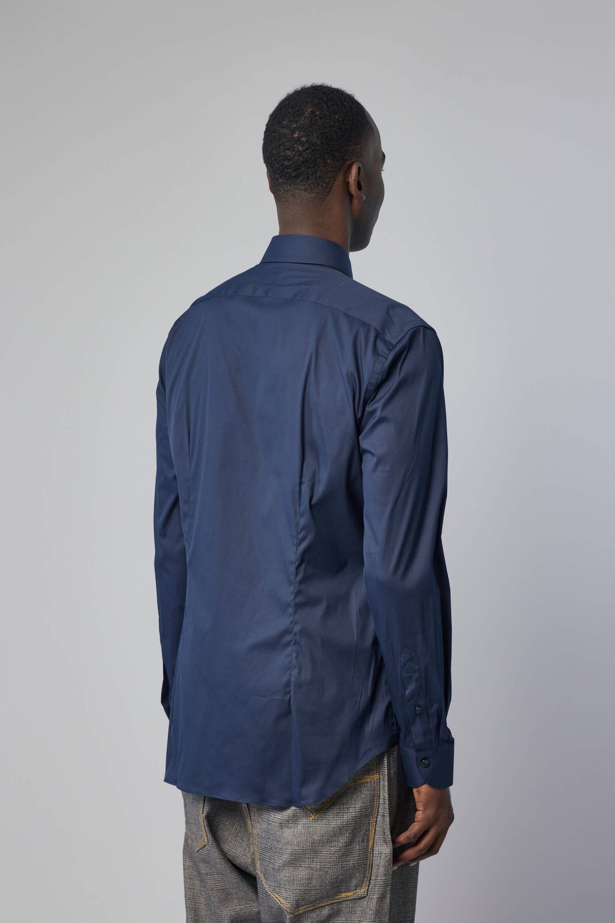 Full view of Xacus classic white dress shirt on model