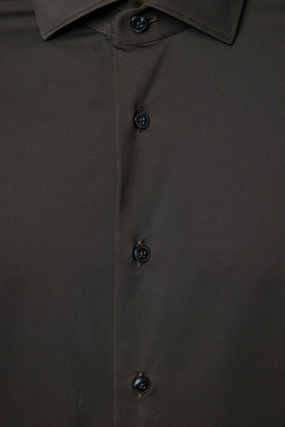 Collar and button detail of Italian-crafted dress shirt