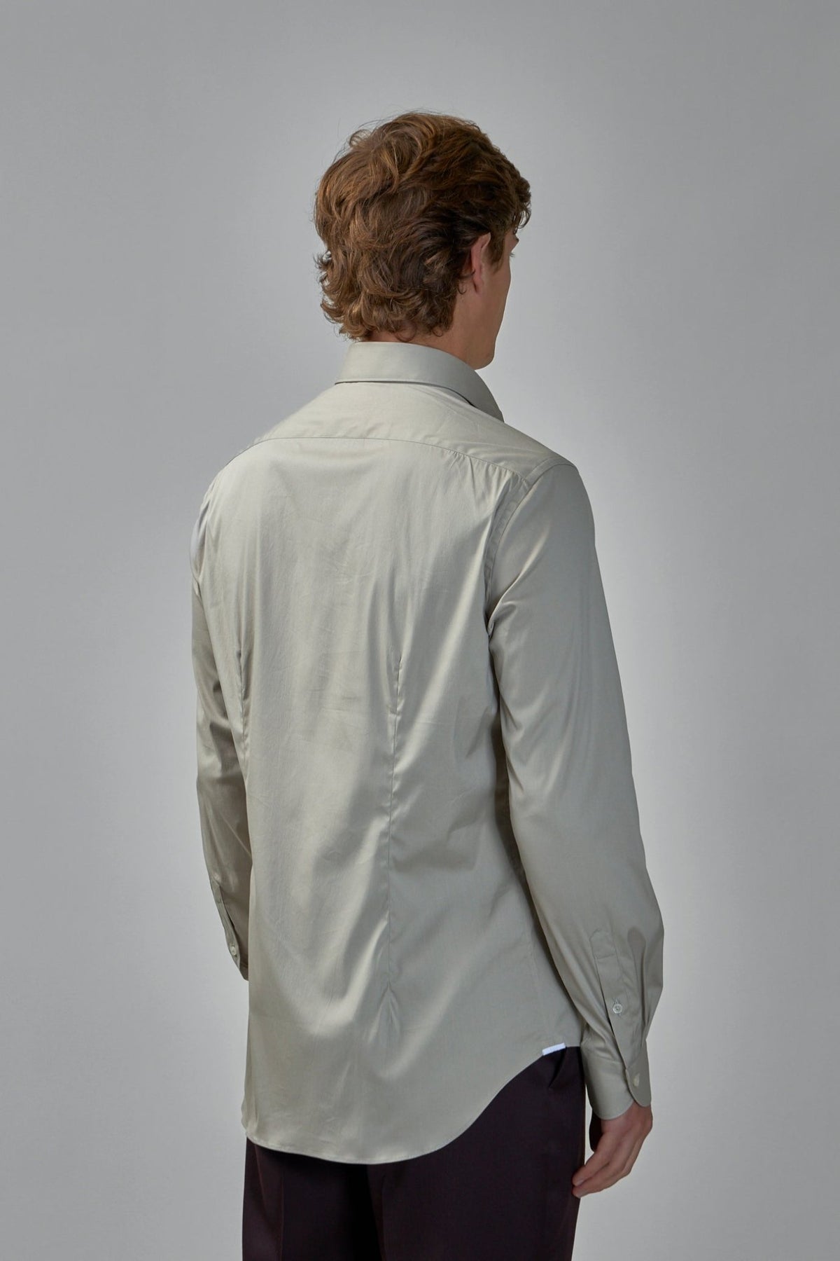 Detail shot of pointed collar and button placket on Xacus dress shirt