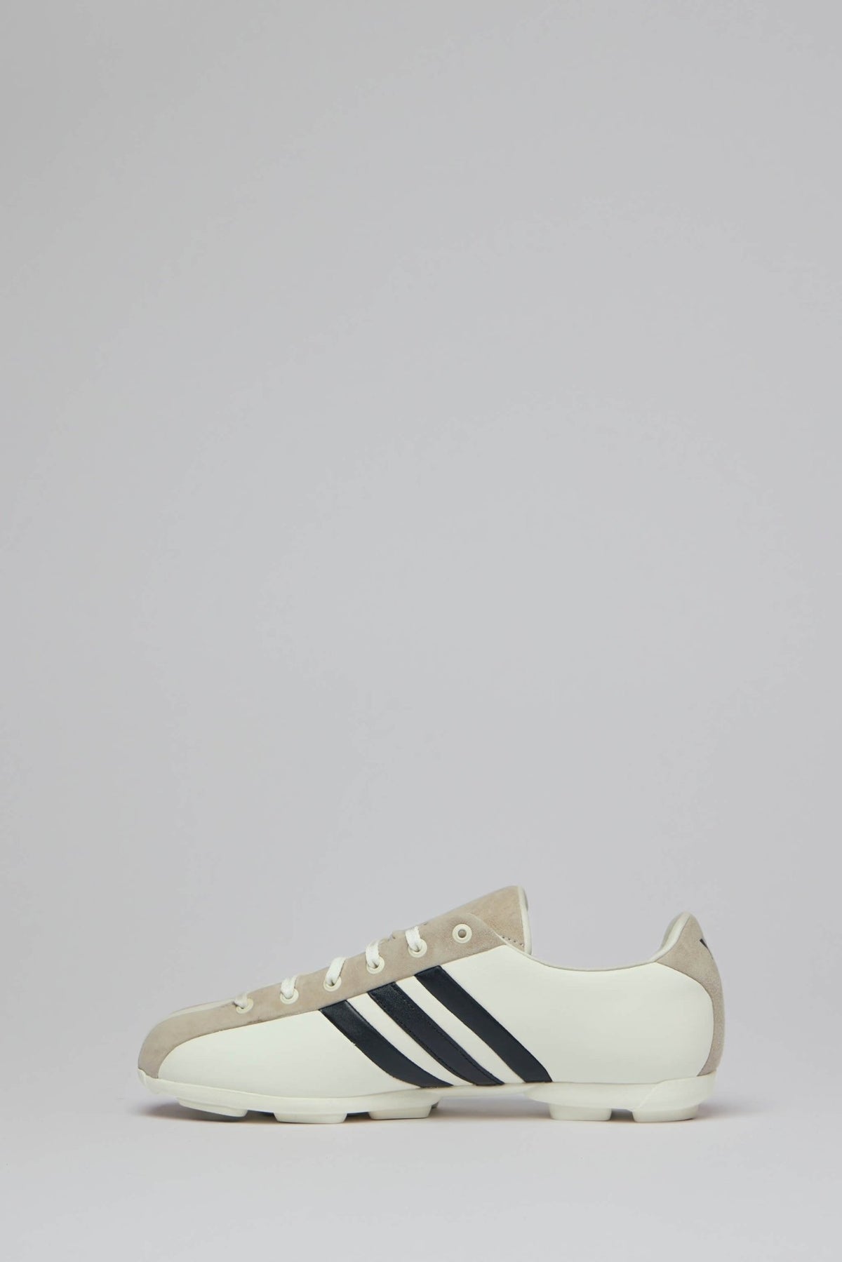 Close-up of Y-3 sneaker sole and back branding detail